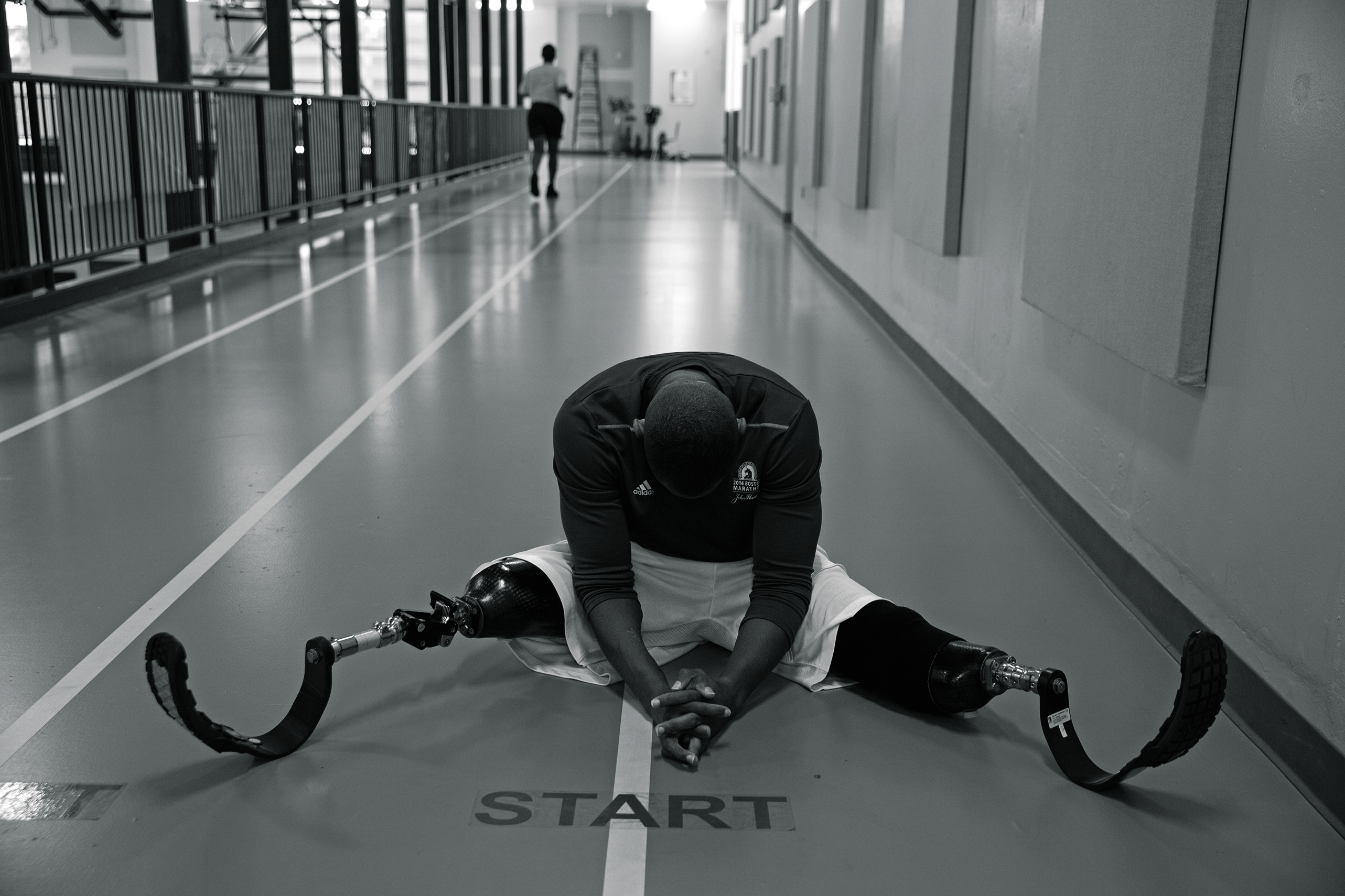 When King got prosthetic legs in November 2012, he says he was “discouraged” because he couldn’t walk for more than 10 minutes at a time. But after five months of practice, he graduated to running blades. King took his first jog at one of Walter Reed’s indoor tracks, below, while watching coverage of the Boston Marathon bombing. He vowed to run it next year.