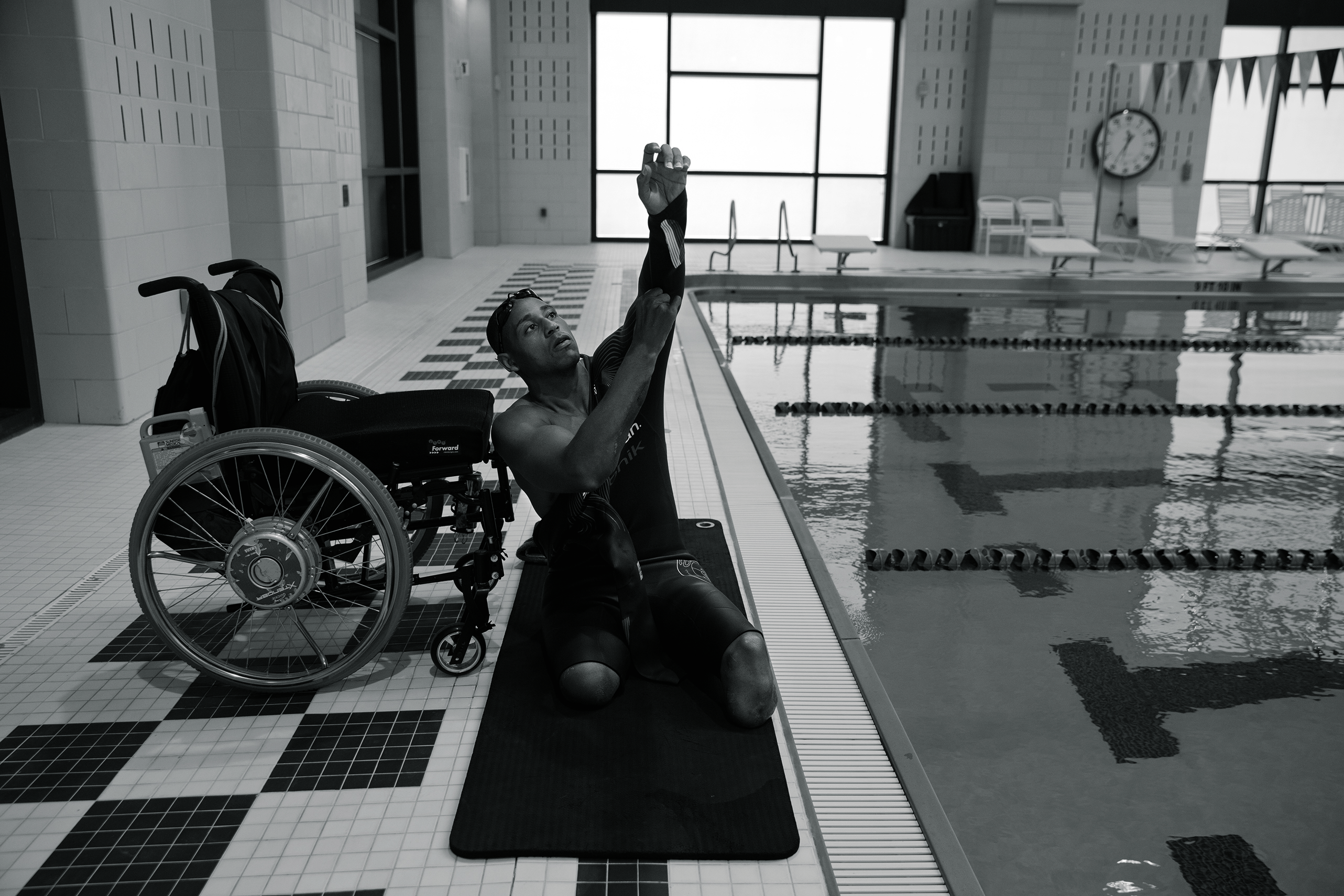 Before he started swimming at a Walter Reed pool, above, King would often fall asleep to audio of motivational speakers and Bible verses and play around on his iPad, searching for inspiration and a new talent. On a whim, he typed in “double amputee running” and was struck by videos of Scott Rigsby, a double-leg-amputee triathlete. “It felt so good to see that was possible,” he says. “I was like, Man, maybe this is what I’m supposed to do.”