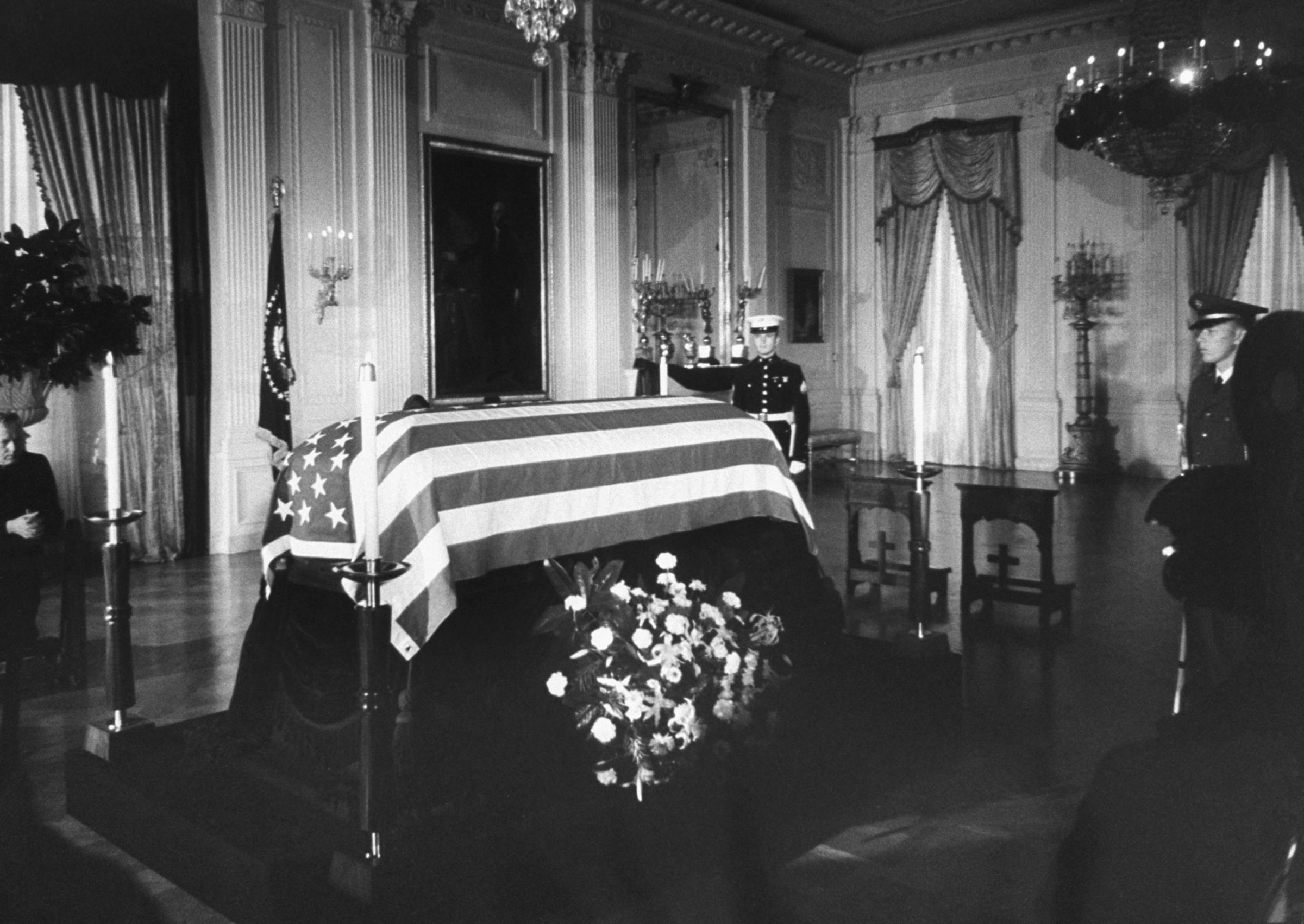 John F. Kennedy's flag-draped casket lies in state in Washington, D.C., November 1963