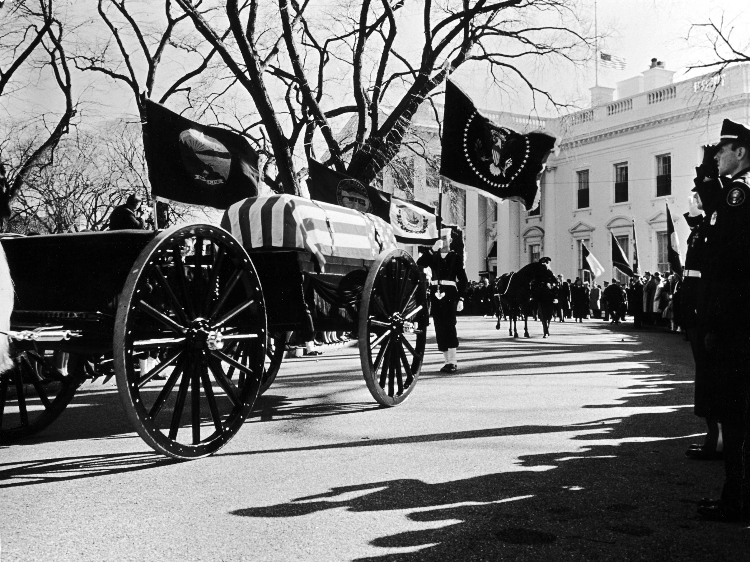 John F. Kennedy's cortege leaves the White House, November 1963.