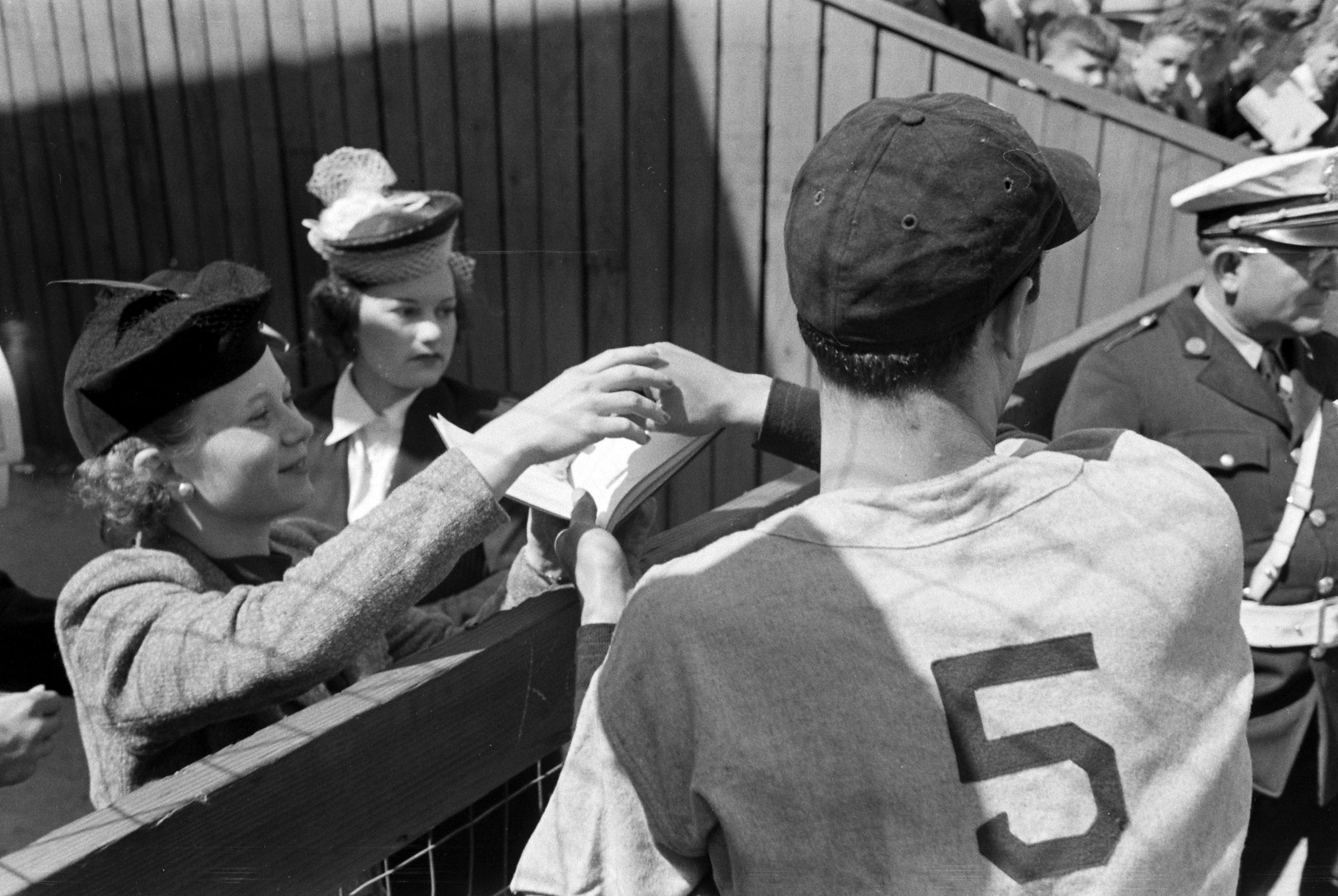 Joe DiMaggio and fans, 1939.