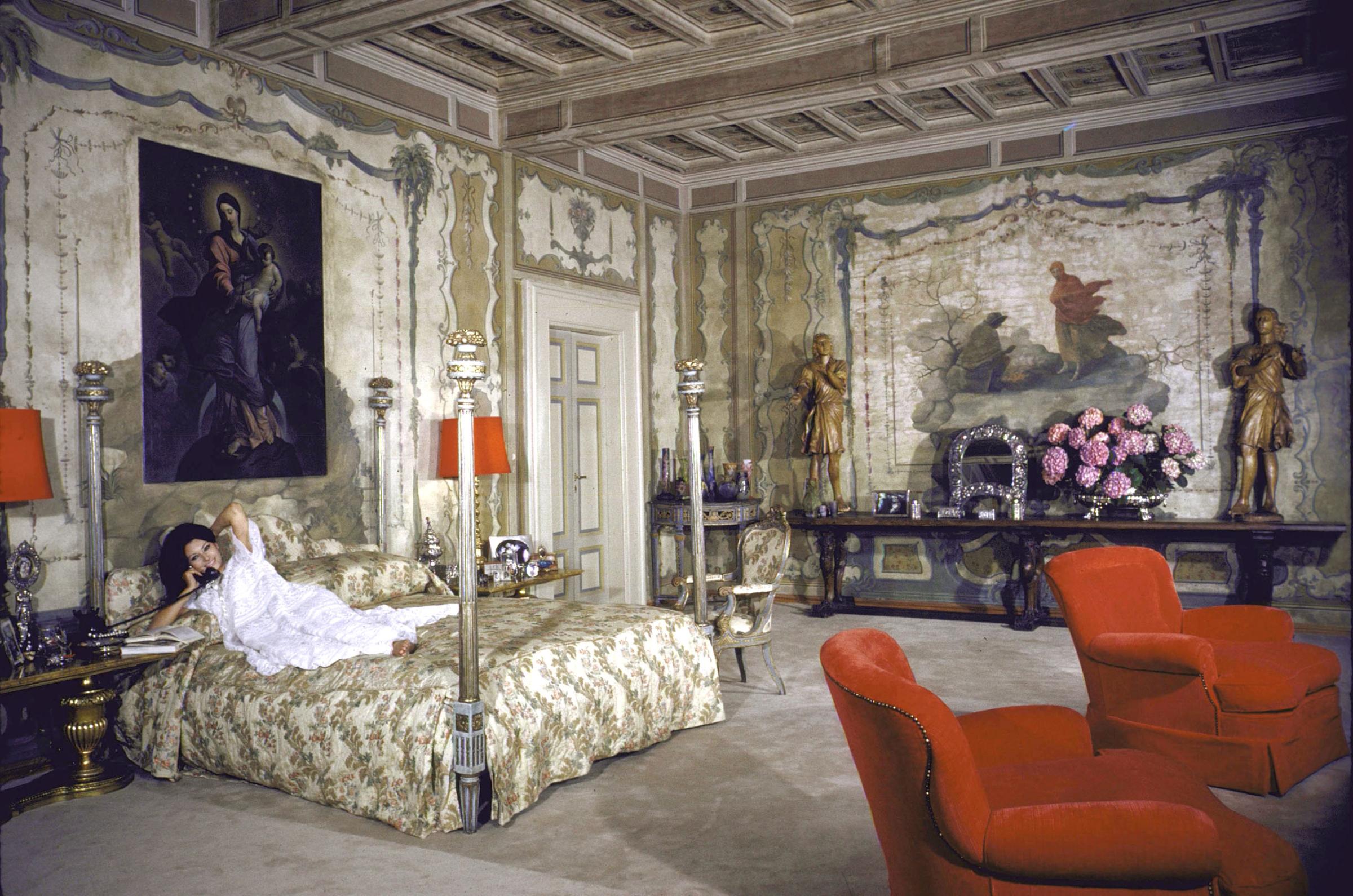 Sophia Loren on her bed in her Italian villa, 1964.