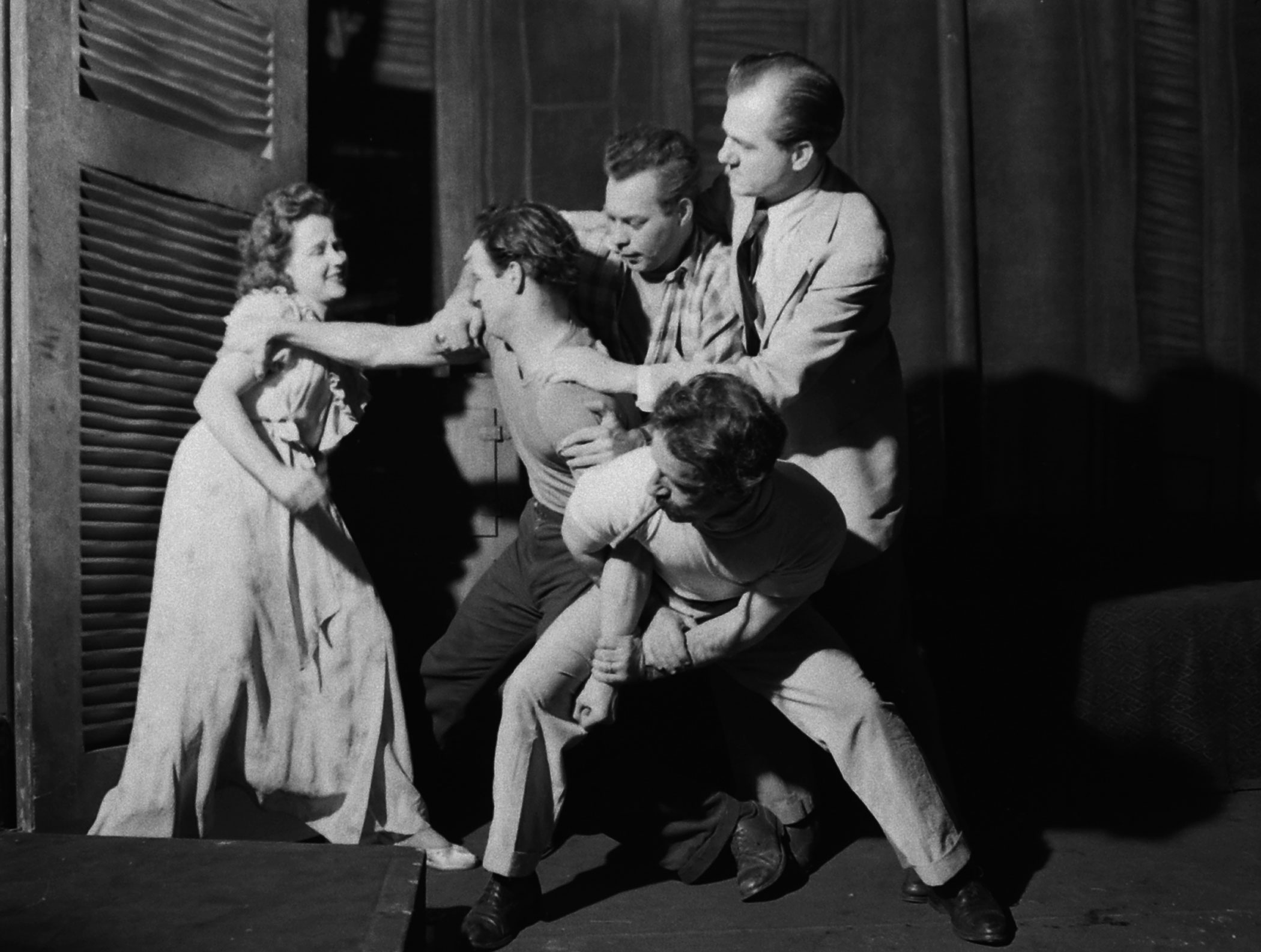 Kim Hunter (left), Marlon Brando, Karl Malden and others in rehearsal for the original production of A Streetcar Named Desire.