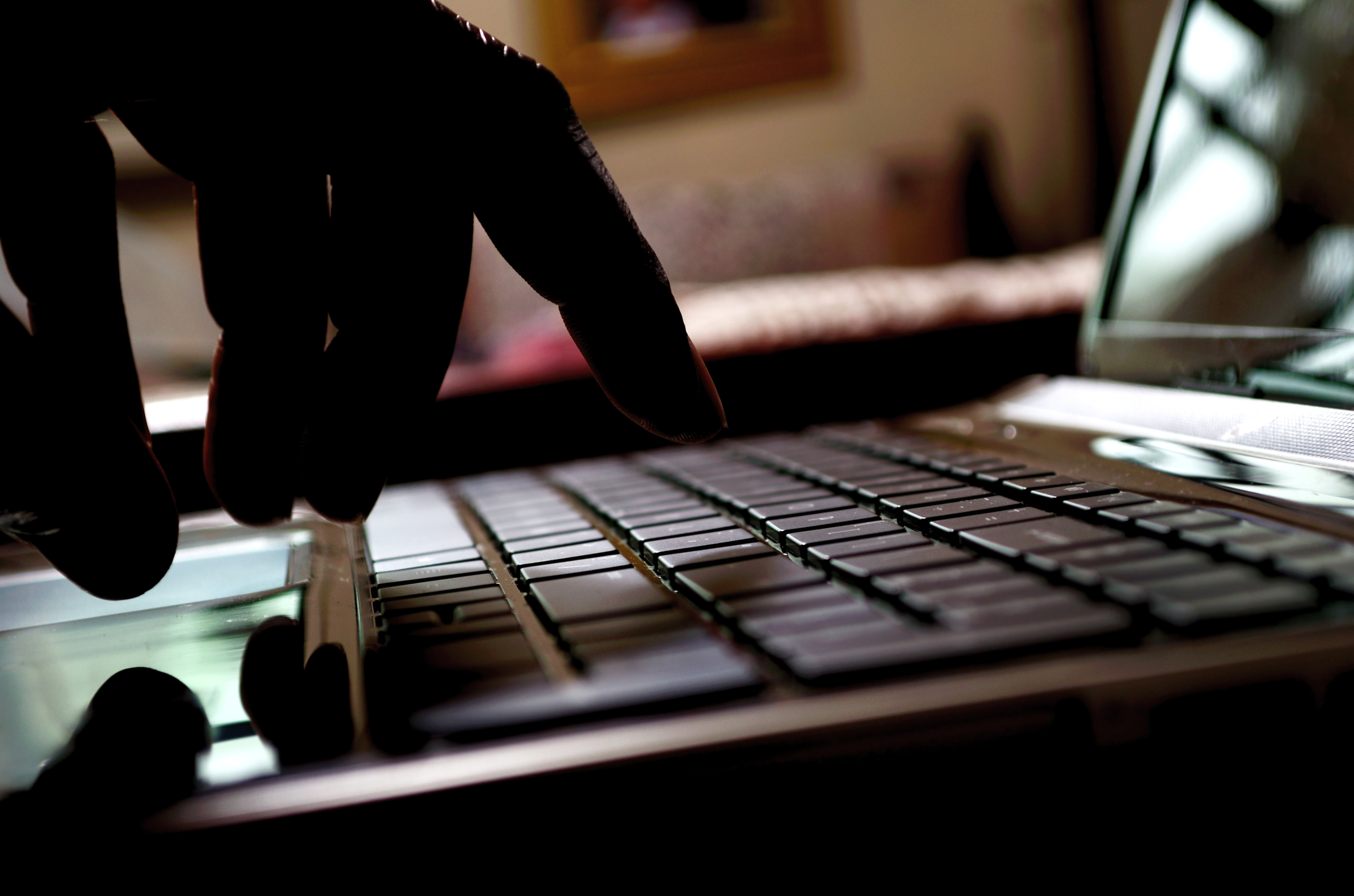 Person typing on a laptop. (Benjamin Howell&mdash;Getty Images)