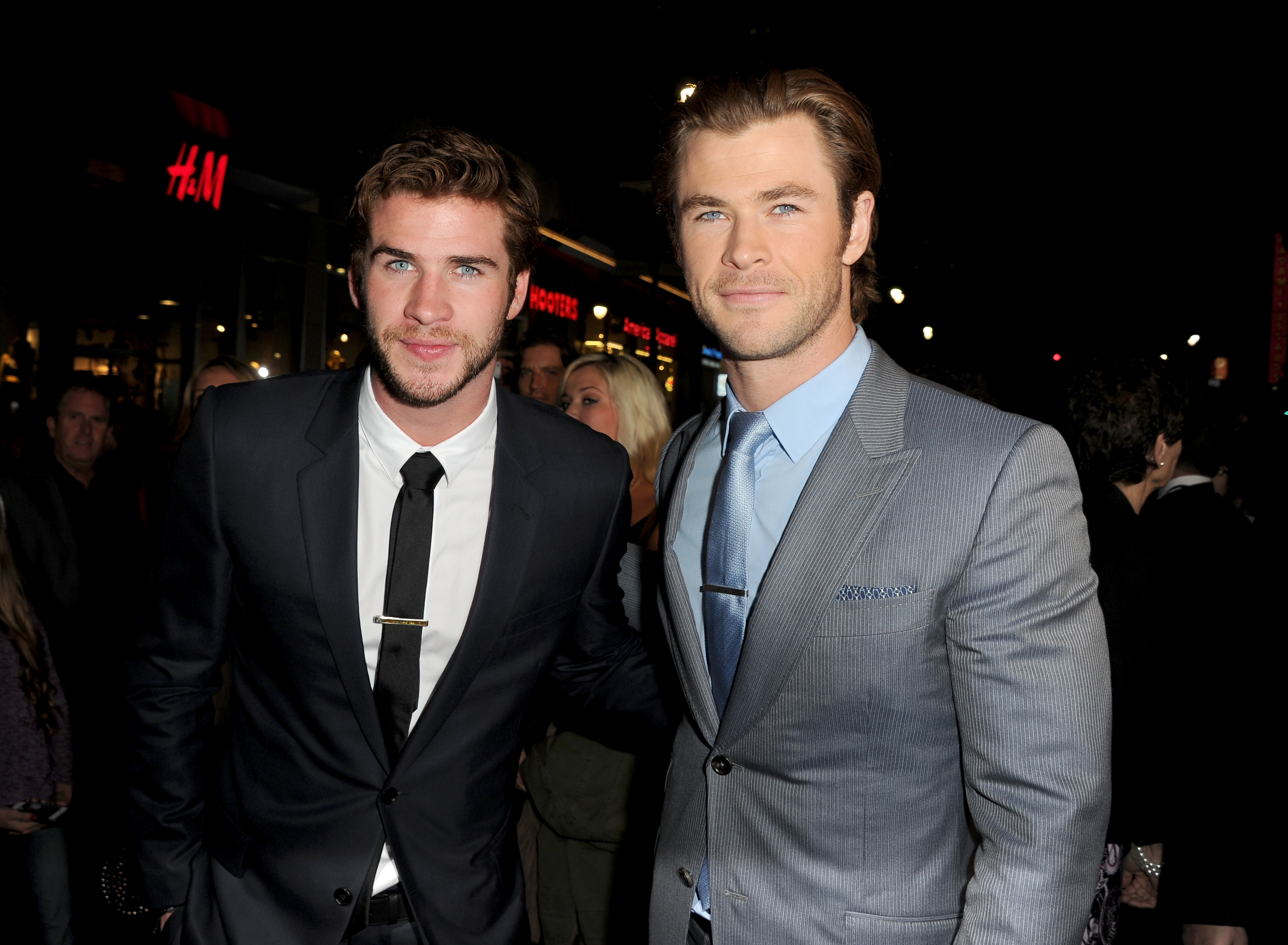 Actors Liam Hemsworth (L) and Chris Hemsworth arrive at the premiere of Marvel's "Thor: The Dark World" at the El Capitan Theatre on November 4, 2013 in Hollywood, California. (Kevin Winter—Getty Images)