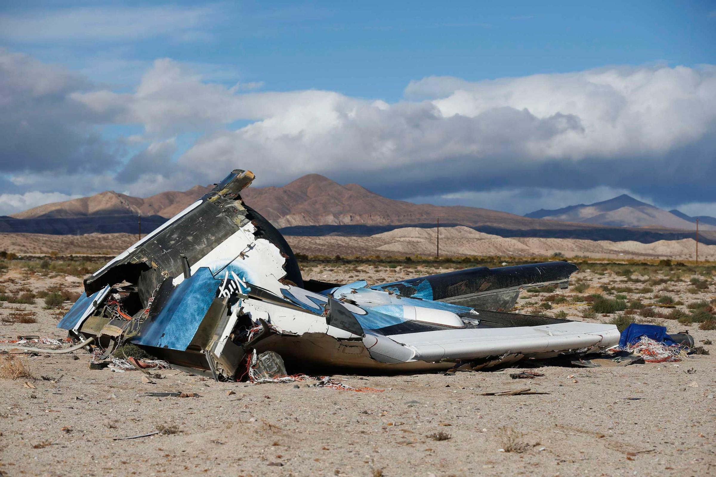 Piece of debris is seen near the crash site of Virgin Galactic's SpaceShipTwo near Cantil