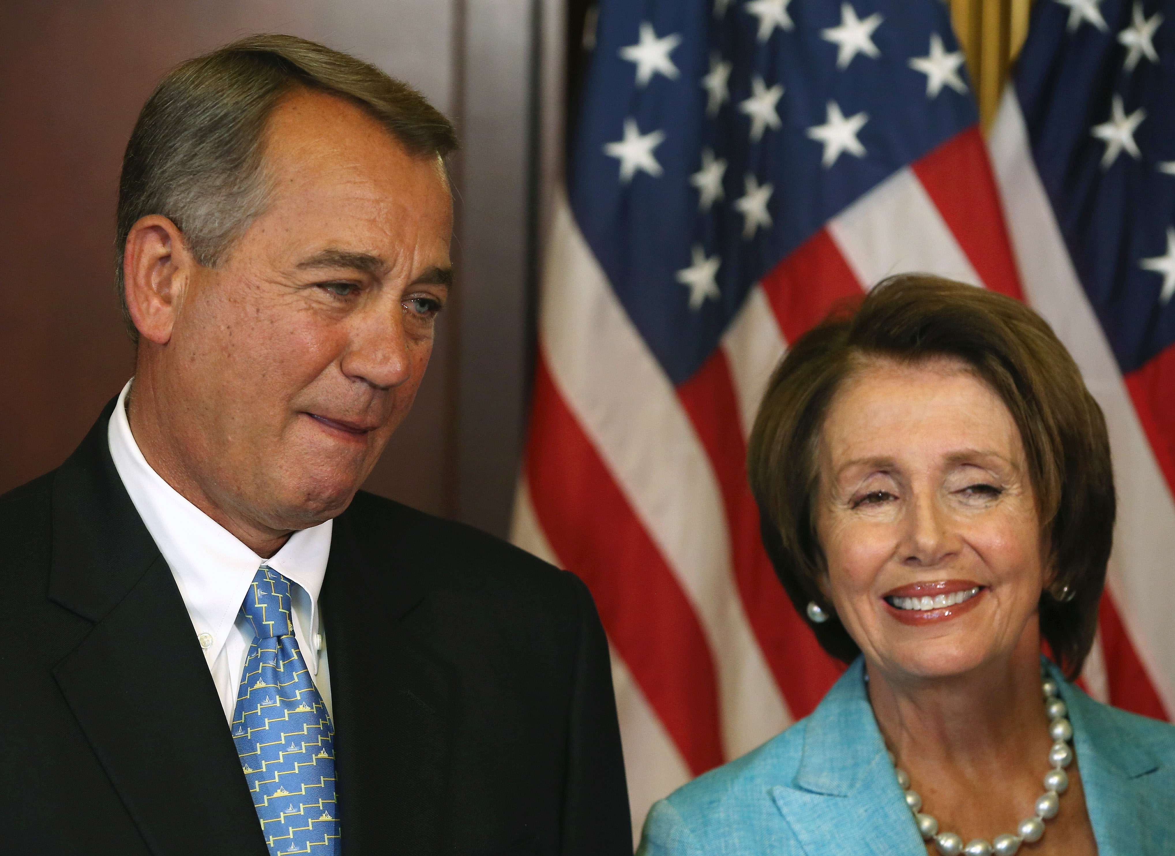 House Minority Leader Nancy Pelosi and House Speaker John Boehner await to sign bipartisan legislation Workforce Innovation and Opportunity Act at the U.S. Capitol, July 11, 2014 in Washington, DC. (Mark Wilson—Getty Images)