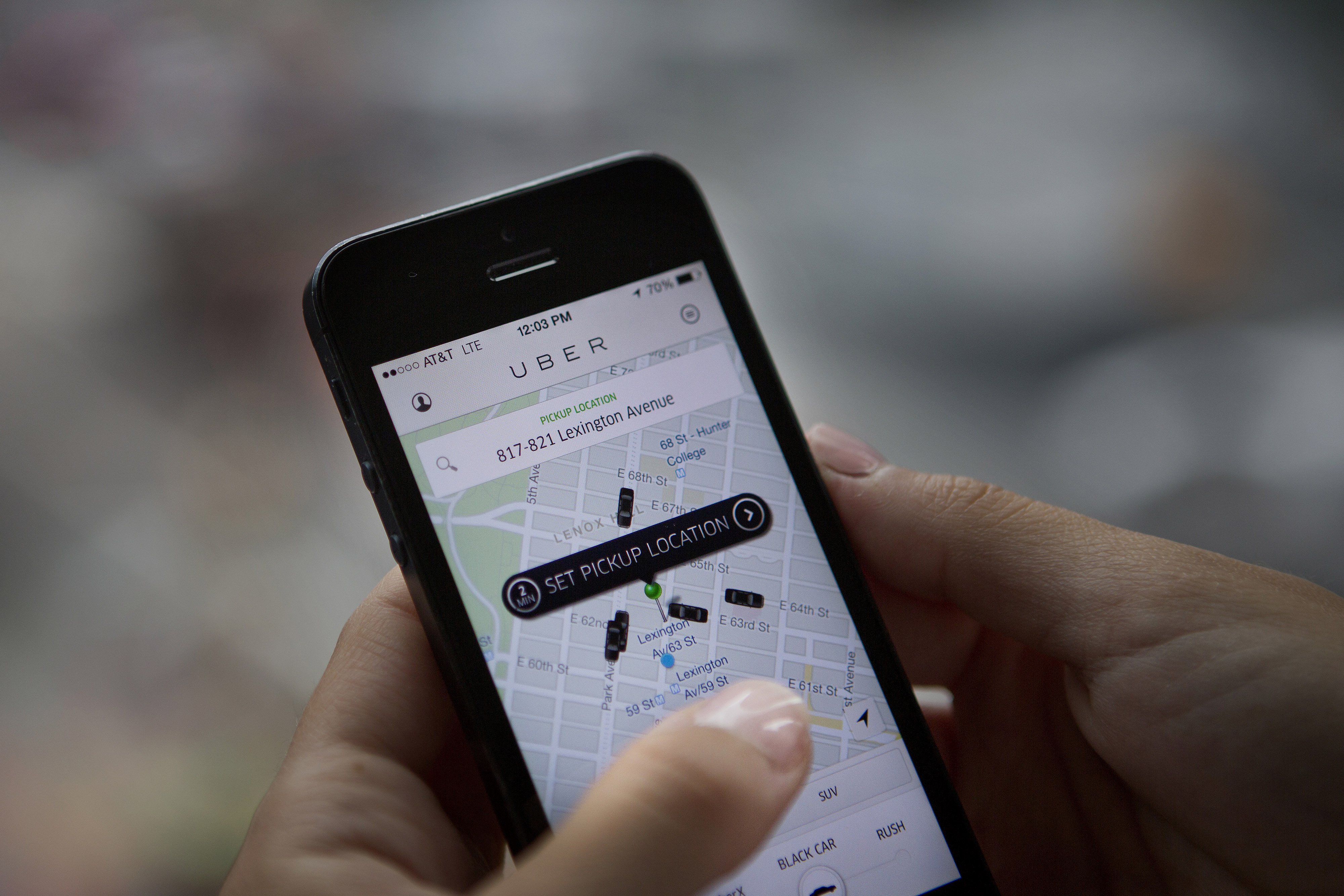 Th Uber Technologies Inc. car service application (app) is demonstrated for a photograph on an Apple Inc. iPhone in New York, U.S., on Wednesday, Aug. 6, 2014. (Bloomberg&mdash;Bloomberg via Getty Images)