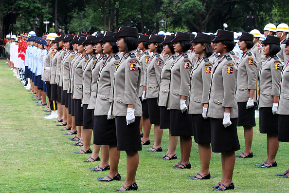 Indonesian army and police during the rehearsal for the ceremony to greet Joko Widodo as the country's new leader at the presidential palace in Jakarta on Oct 19, 2014 (Firman Hidayat—Anadolu Agency/Getty Images)