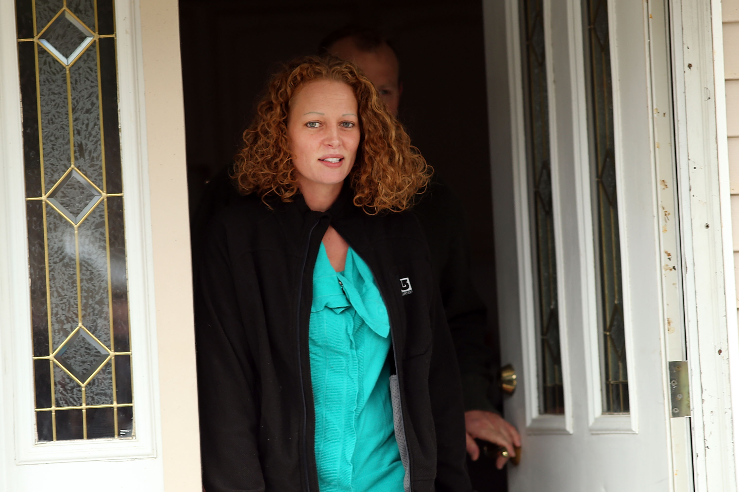 Kaci Hickox walks outside of her home to give a statement to the media on October 31, 2014 in Fort Kent, Maine. (Spencer Platt—Getty Images)