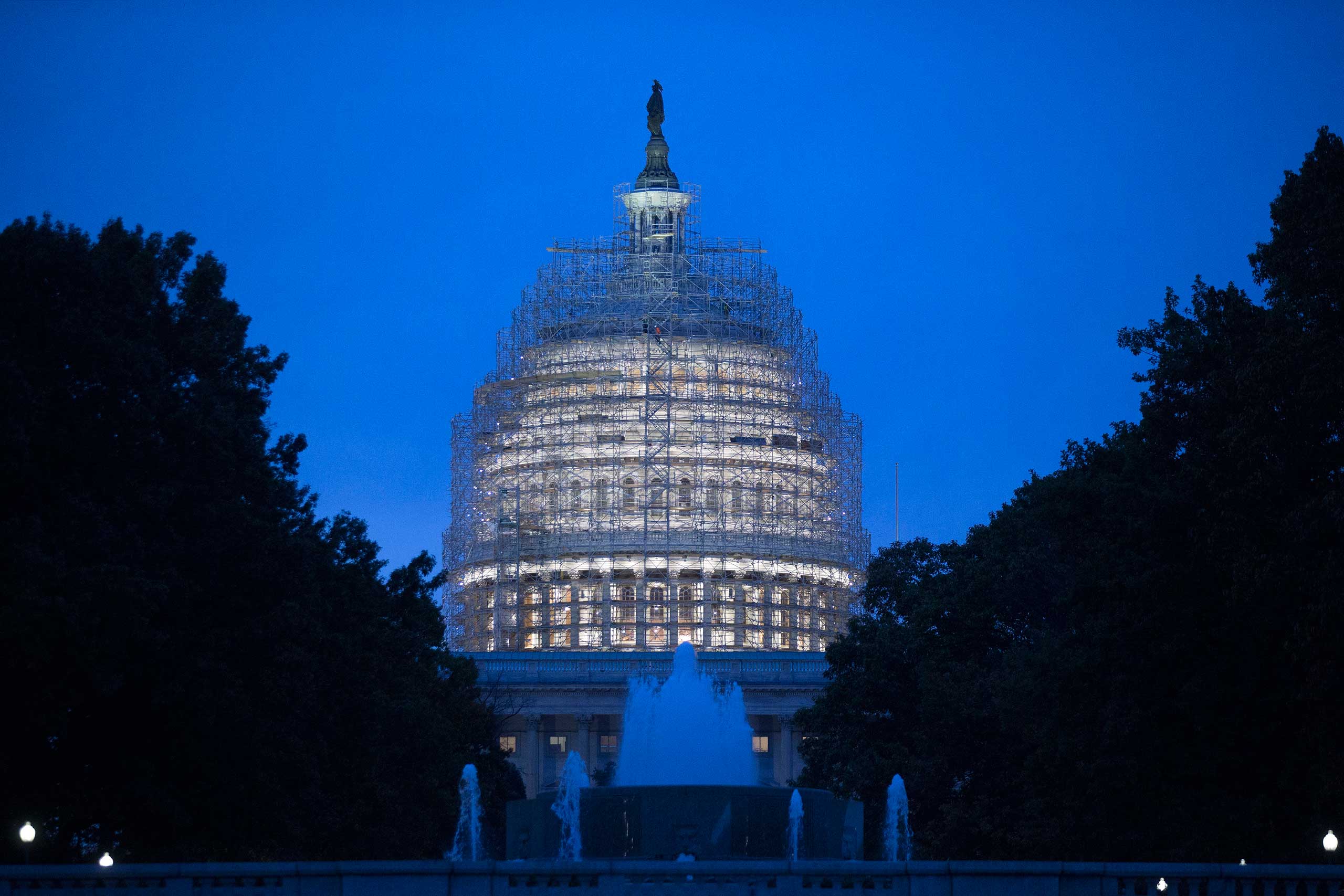 Nov. 5, 2014. Scaffolding surrounds the U.S. Capitol building while it undergoes repairs in Washington, D.C. Republicans roared back in the midterm elections on Tuesday, capturing control of the Senate from Democrats, winning crucial governor races and solidifying their majority in the U.S. House of Representatives. (Andrew Harrer—Bloomberg via Getty Images)