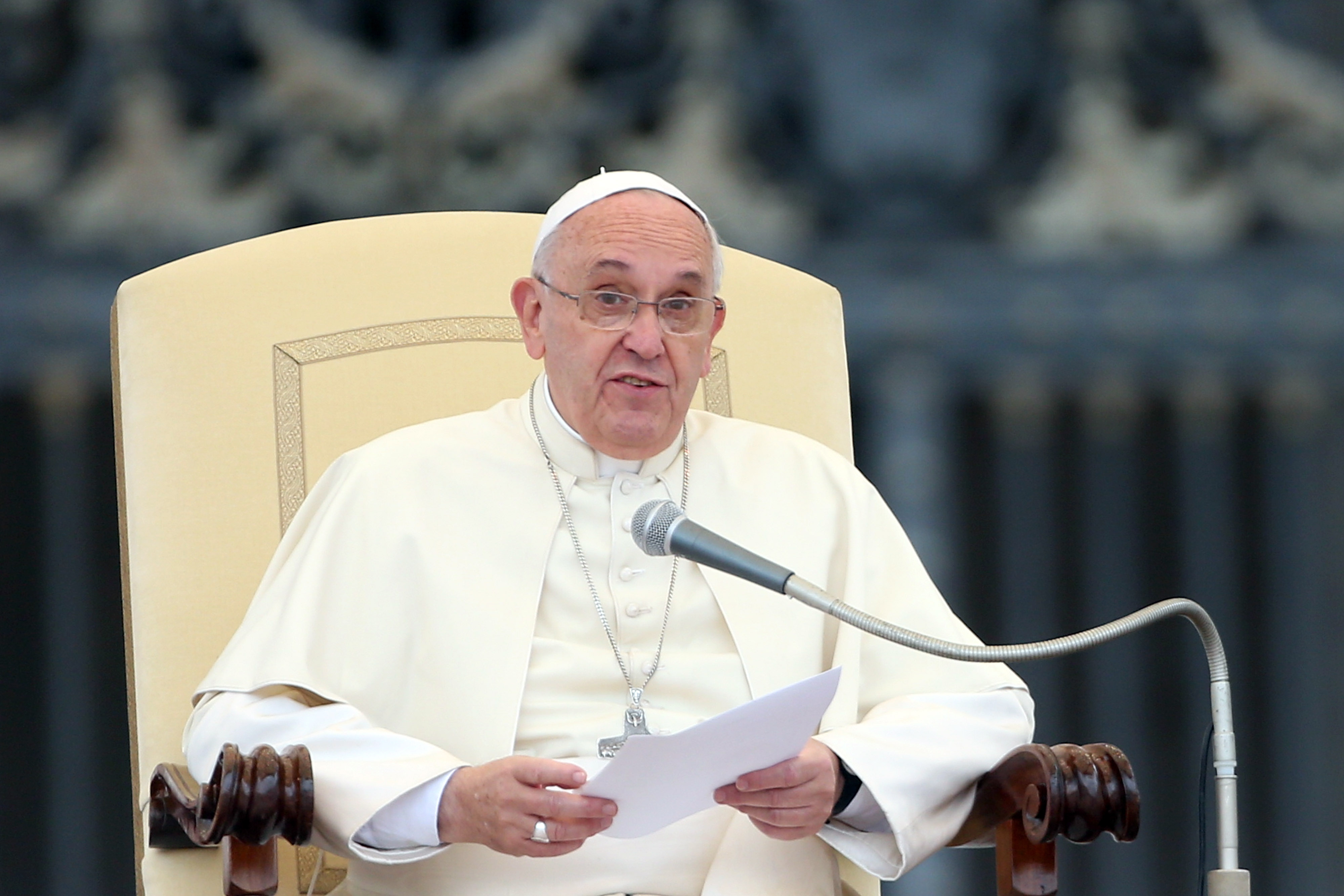 Pope Francis speaks during his weekly audience in St. Peter's square on November 12, 2014 in Vatican City, Vatican. During the event, the Pope asked the clergy to be humble, urging them to be understanding towards their communities and to avoid an authoritarian attitude. (Franco Origlia—Getty Images)