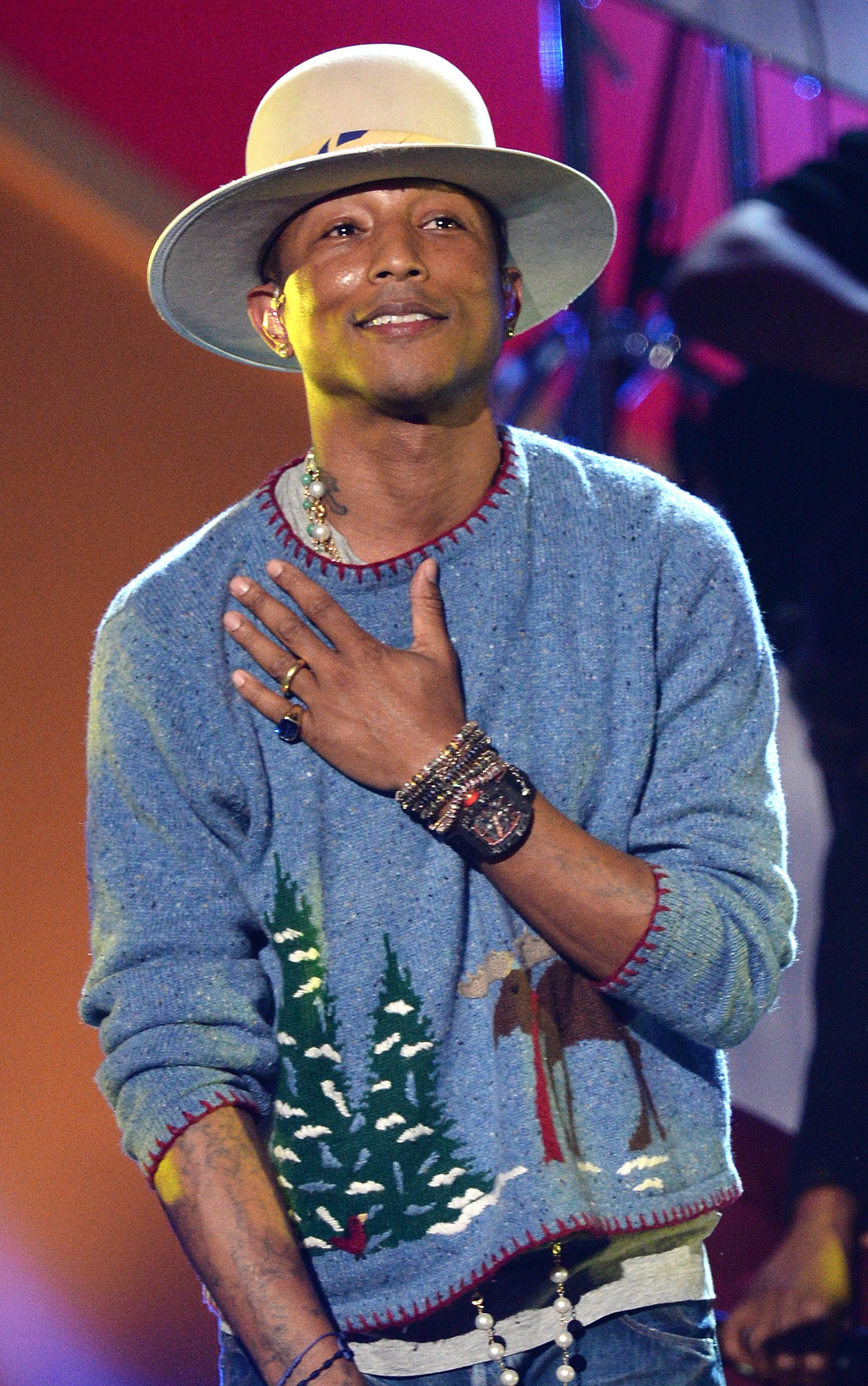 Singer Pharrell Williams performs at the taping of "A Very Grammy Christmas" at the Shrine Auditorium in Los Angeles, California on November 18, 2014. (Robyn Beck—AFP/Getty Images)