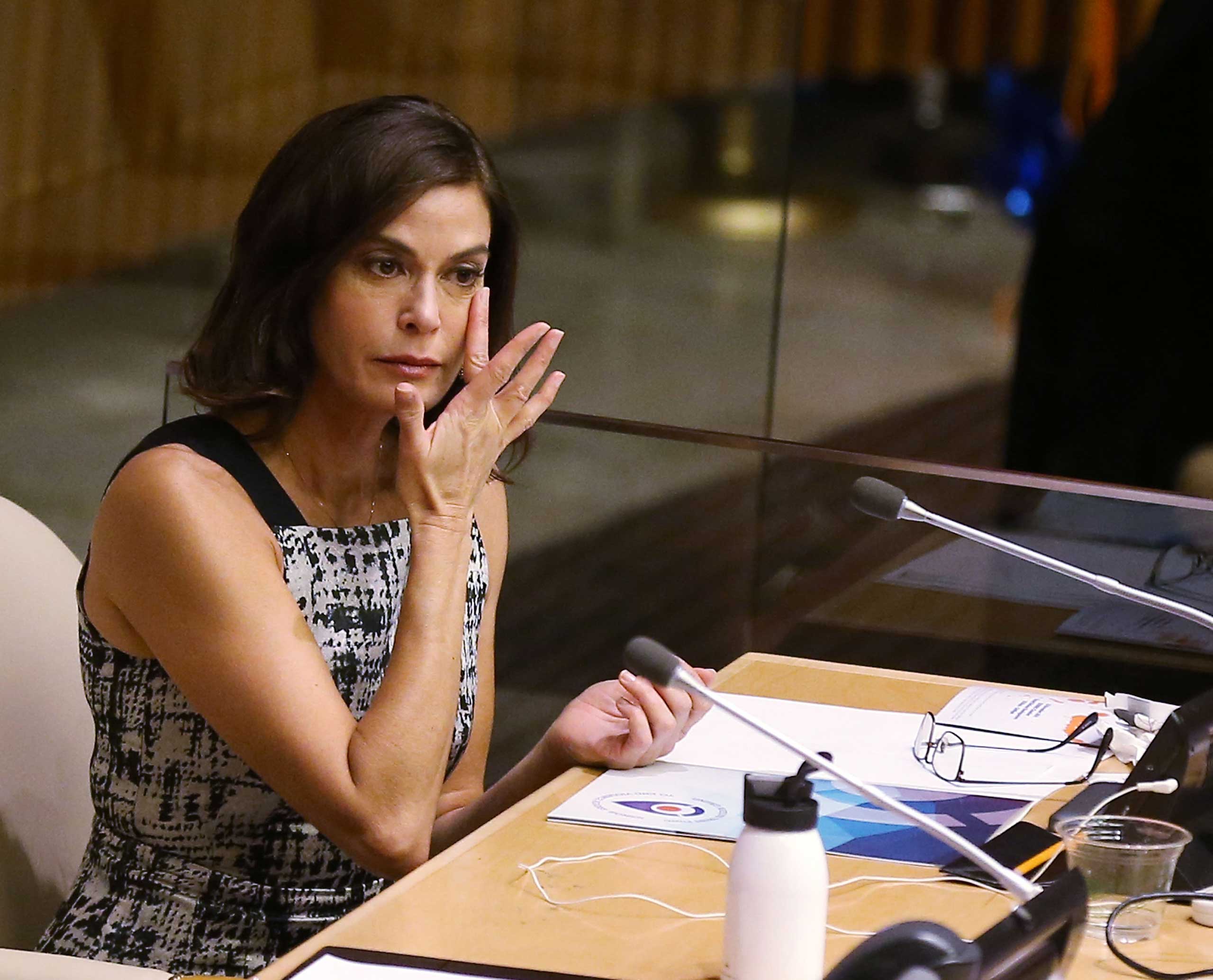Actress Teri Hatcher wipes away tears after her speech during the United Nations Official Commemoration of the International Day For The Elimination Of Violence Against Women on Nov. 25, 2014 in New York. (Jemal Countess—Getty Images)