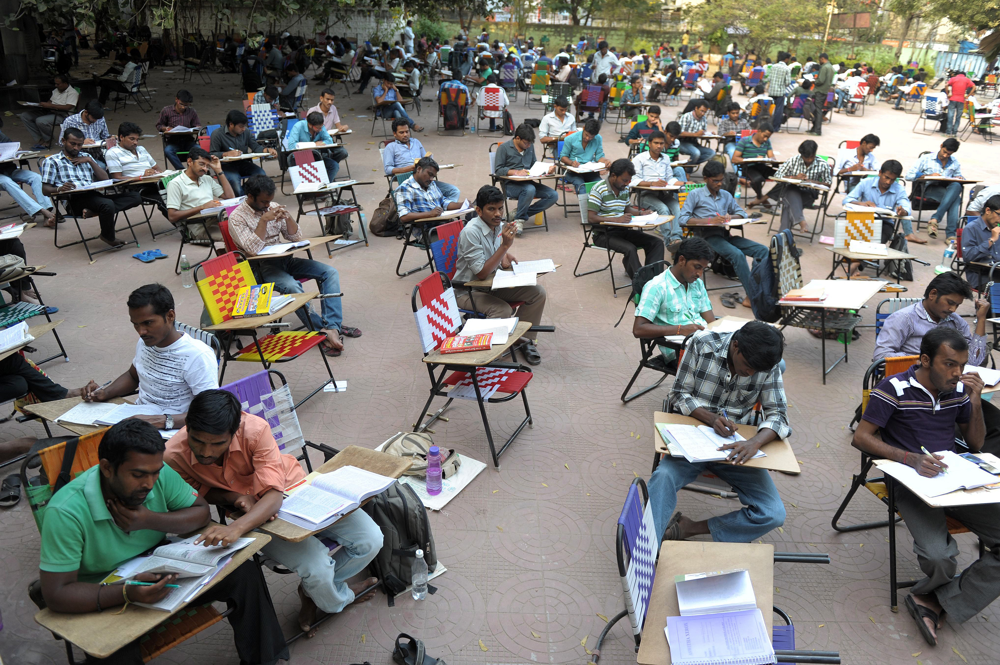 Indian students prepare for competitive exams in an open space of the City Central Library in Hyderabad on February 7, 2014. (NOAH SEELAM—AFP/Getty Images)