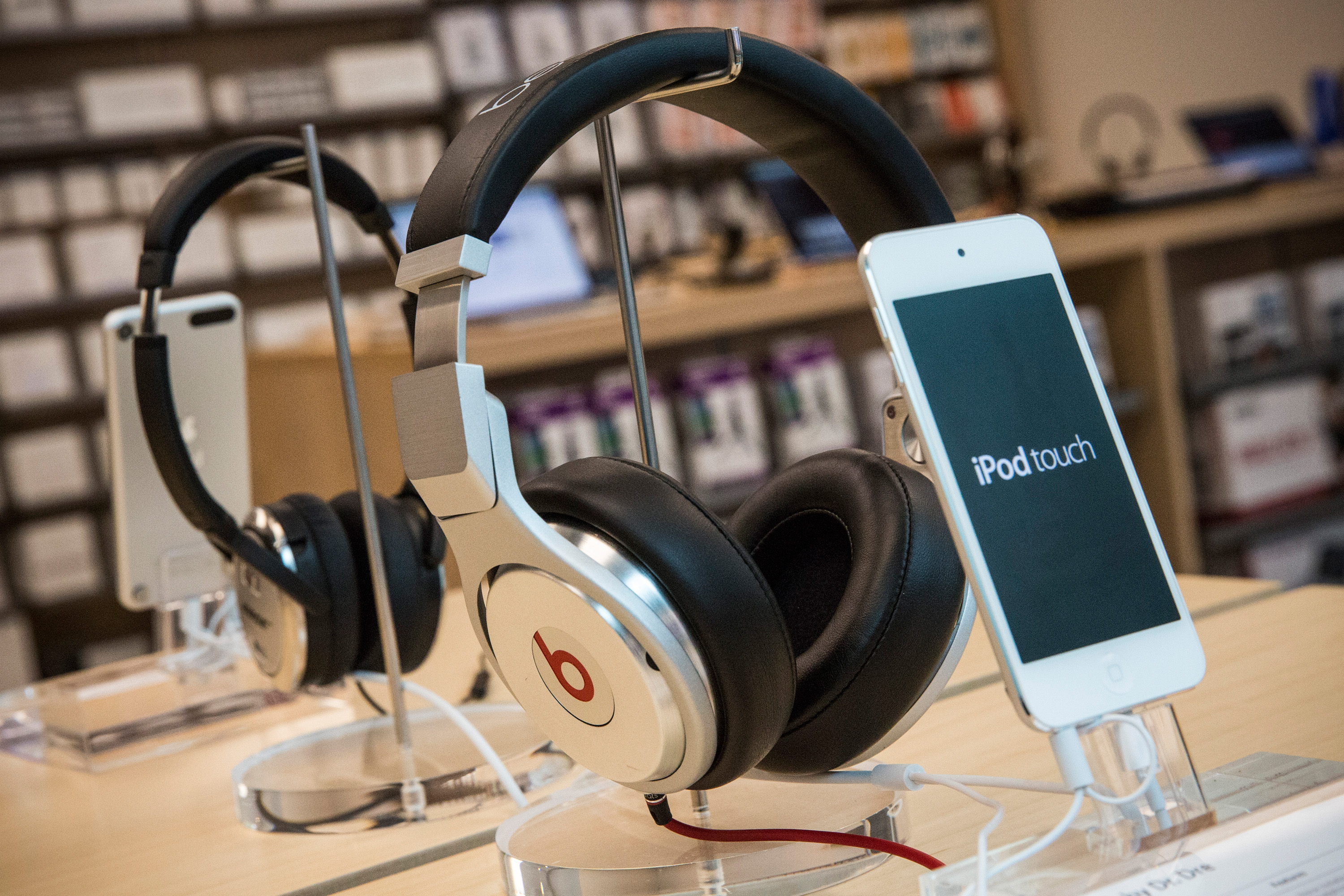 Beats headphones are sold along side iPods in an Apple store on May 9, 2014 in New York City. (Andrew Burton&mdash;Getty Images)