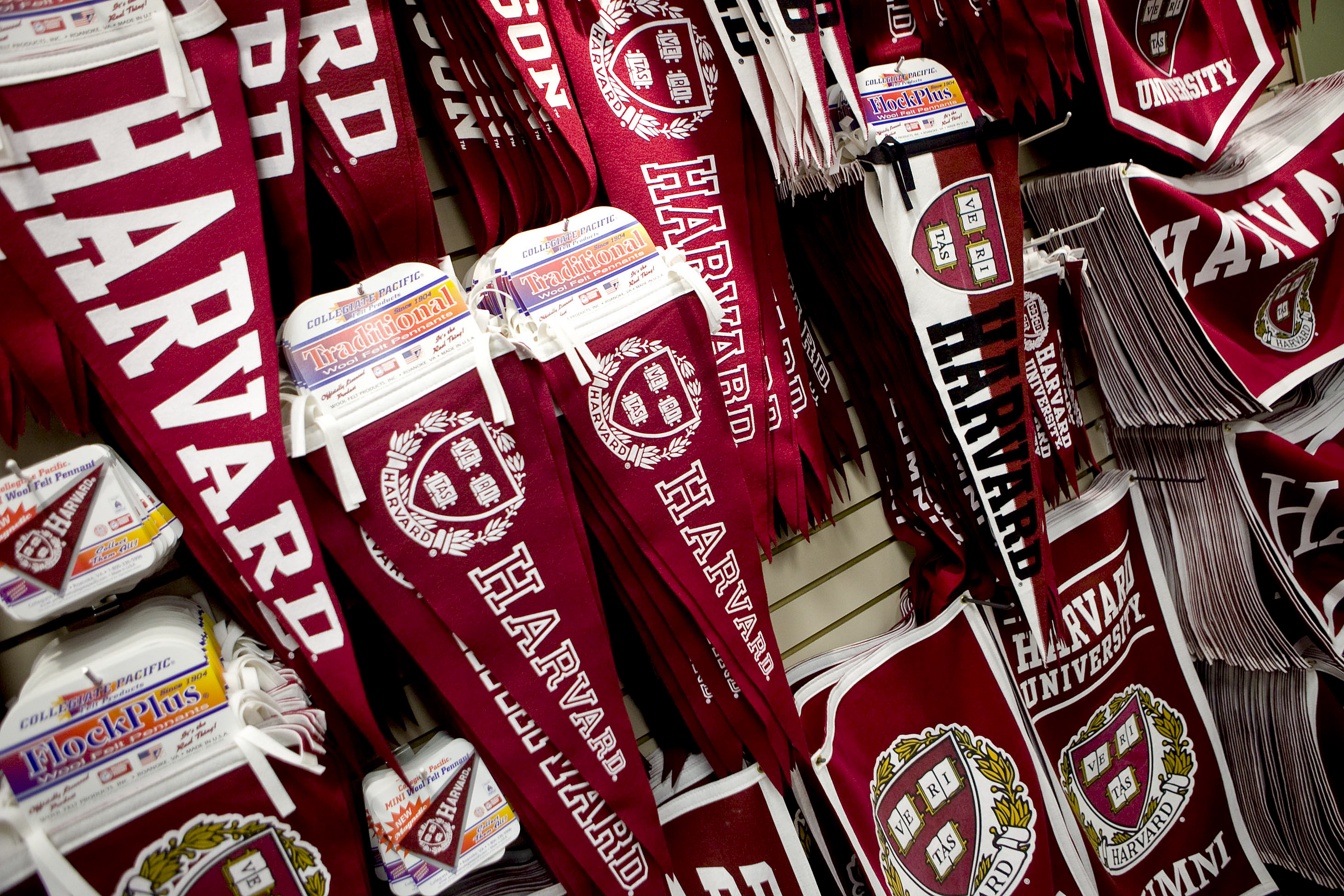 Harvard University pennants sit on sale at the Harvard Cooperative Society in Cambridge, Mass. (Bloomberg/Getty Images)
