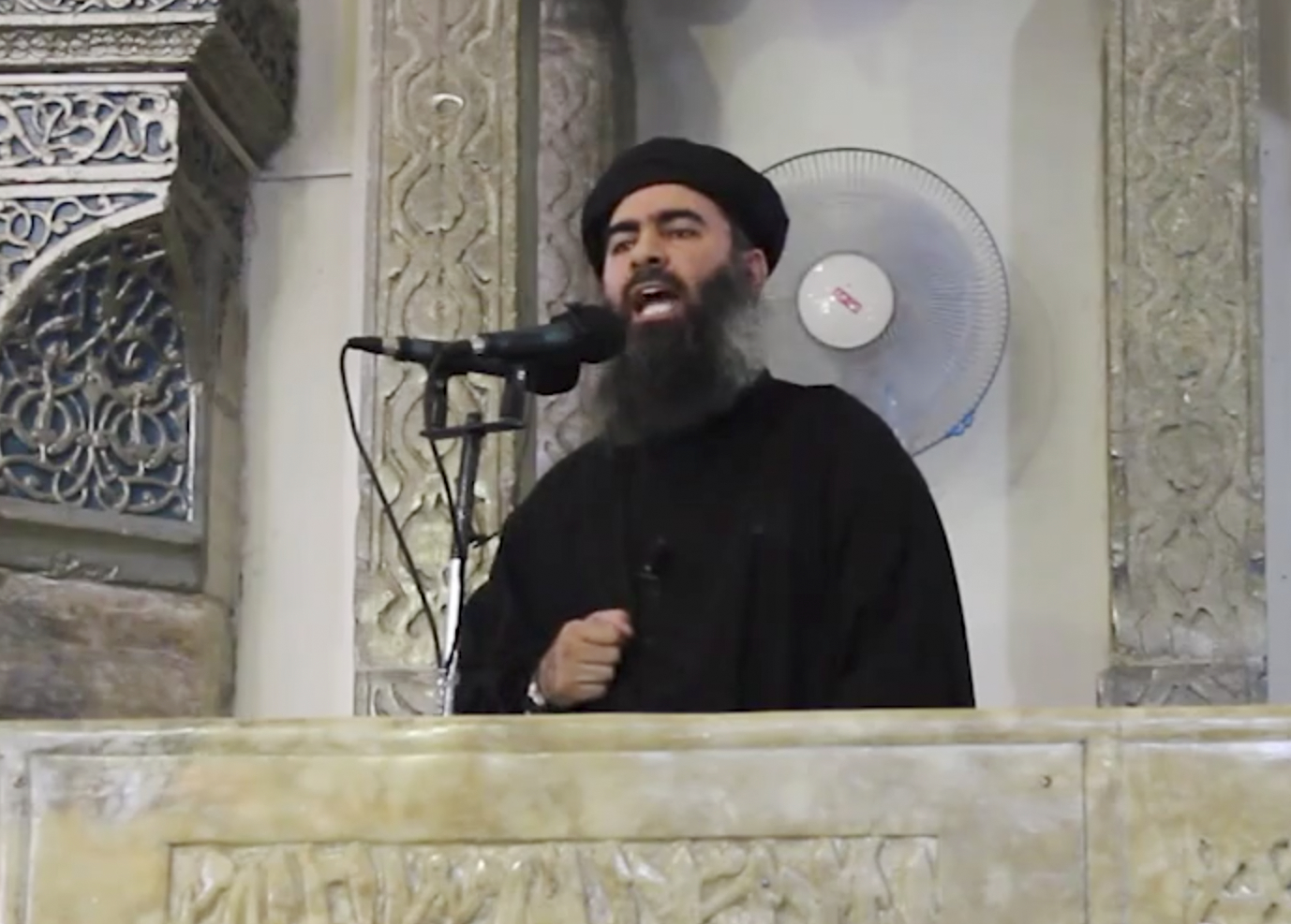 Abu Bakr al-Baghdadi delivering a sermon at a mosque in Iraq on July 5, 2014. (AP)