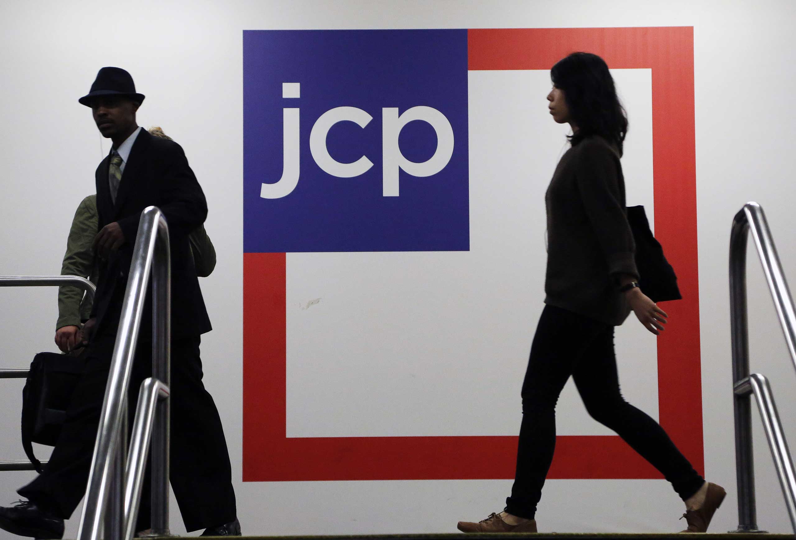 In this April 9, 2013 file photo, customers arrive at a J.C. Penney store in New York. (Mark Lennihan—AP)