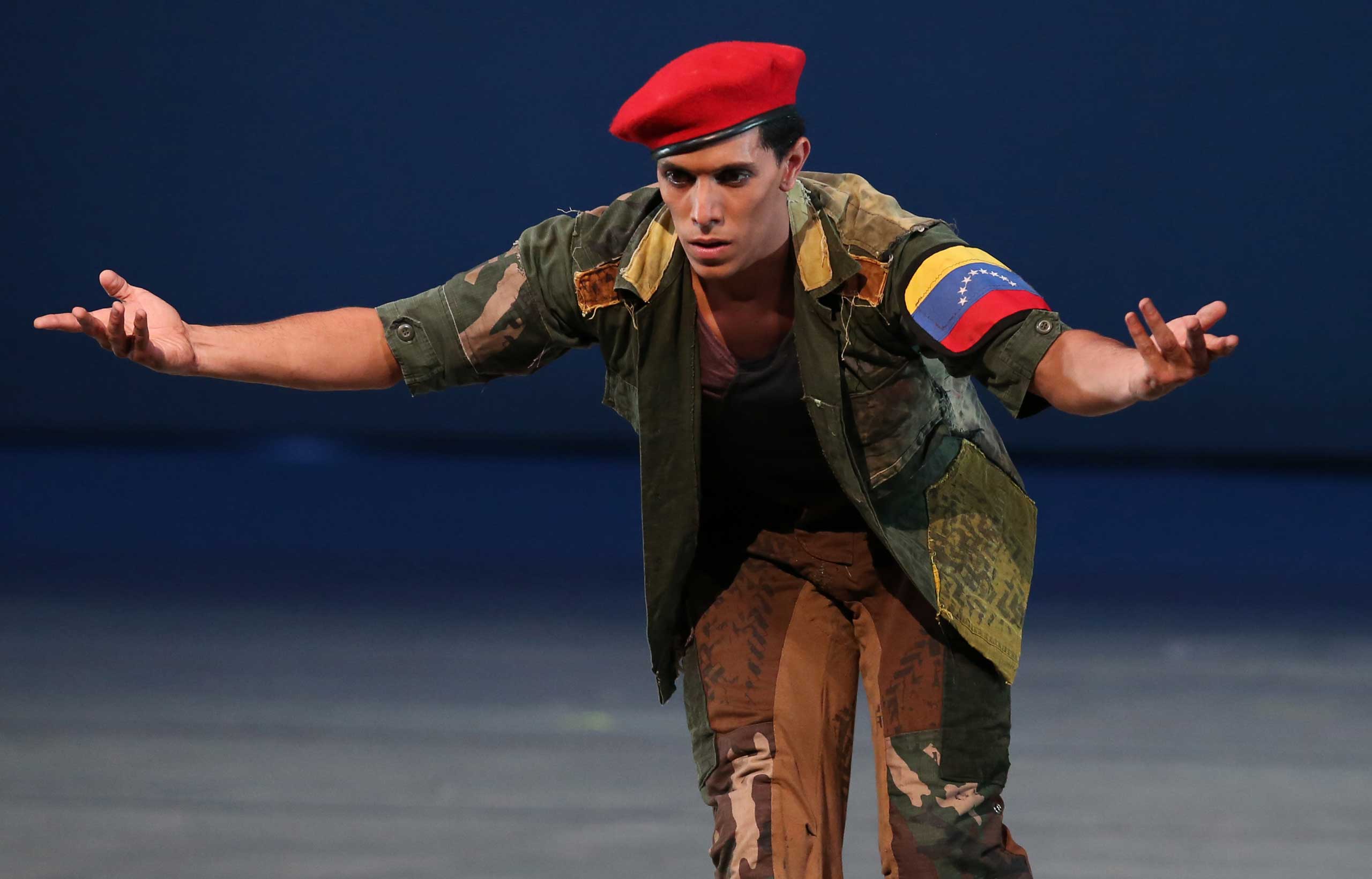 John Lobo, 29, performing as Venezuela's late president Hugo Chavez in the star role of the "Ballet of the Spider-Seller to Liberator", at the Teresa Carreno Theater in Caracas, Nov. 27, 2014. (Ariana Cubillos—AP)