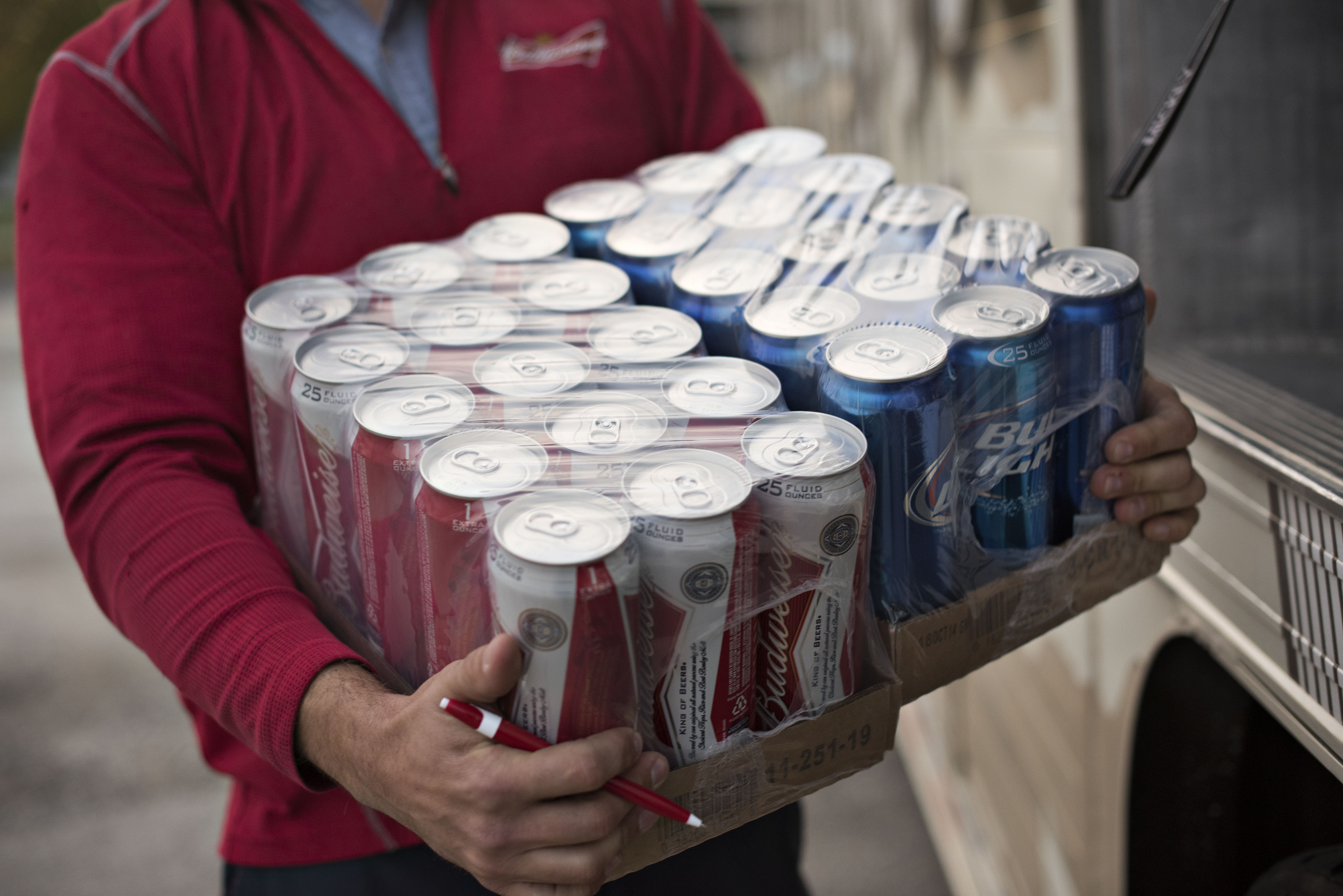 Jeff Allen, a driver for Brewers Distributing Co., delivers Anheuser-Busch beer in Pekin, Illinois, U.S., on Thursday, Oct. 30, 2014. (Bloomberg&mdash;Bloomberg via Getty Images)