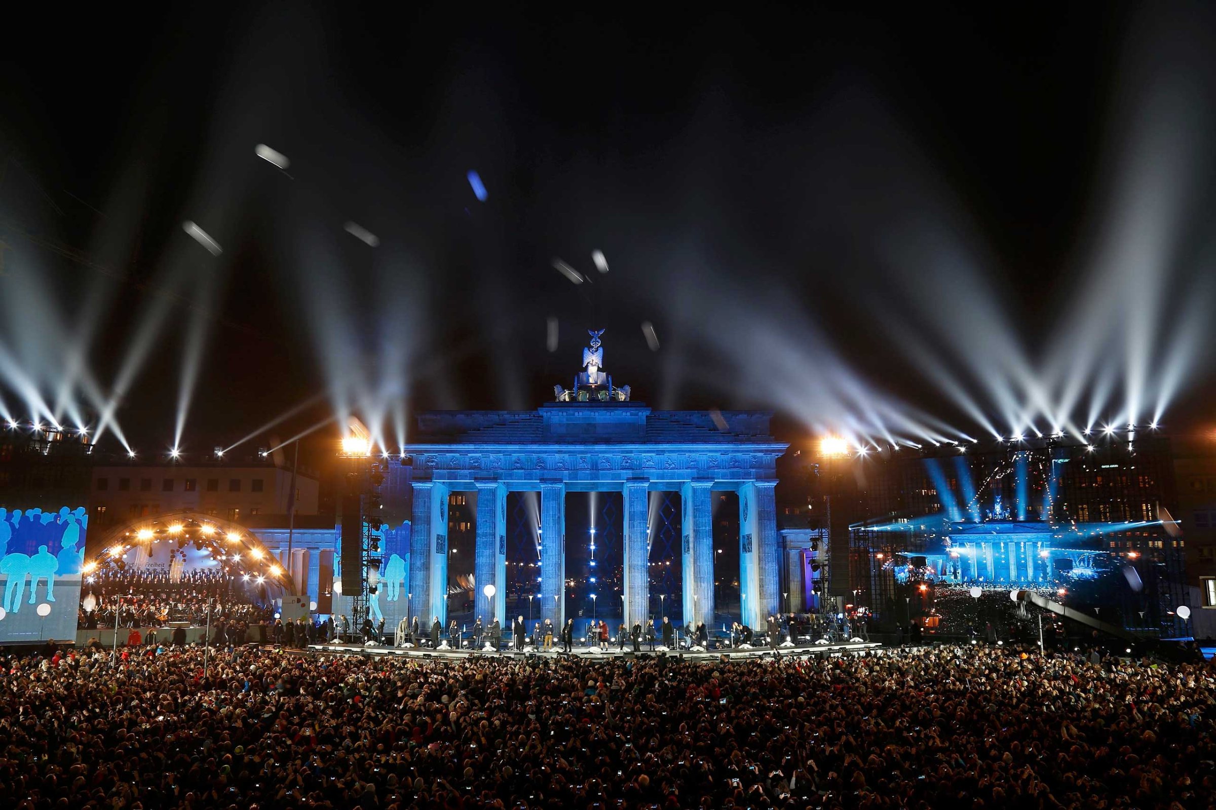 Balloons which were part of the installation 'Lichtgrenze' (Border of Light) are released in front of the Brandenburg Gate in Berlin