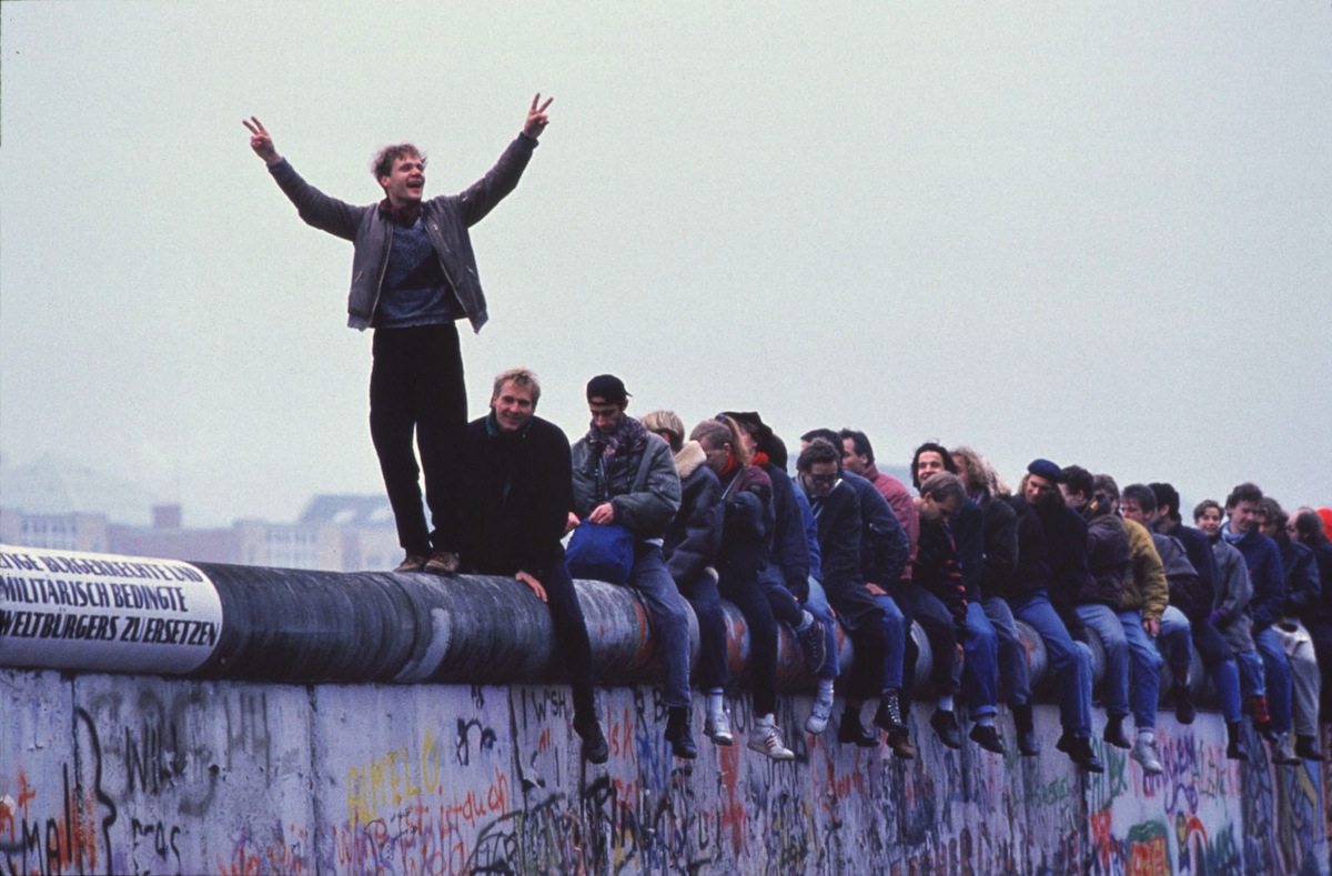 West Germans celebrate atop the Berlin Wall on Nov. 12, 1989. (Stephen Jaffe—Getty Images)