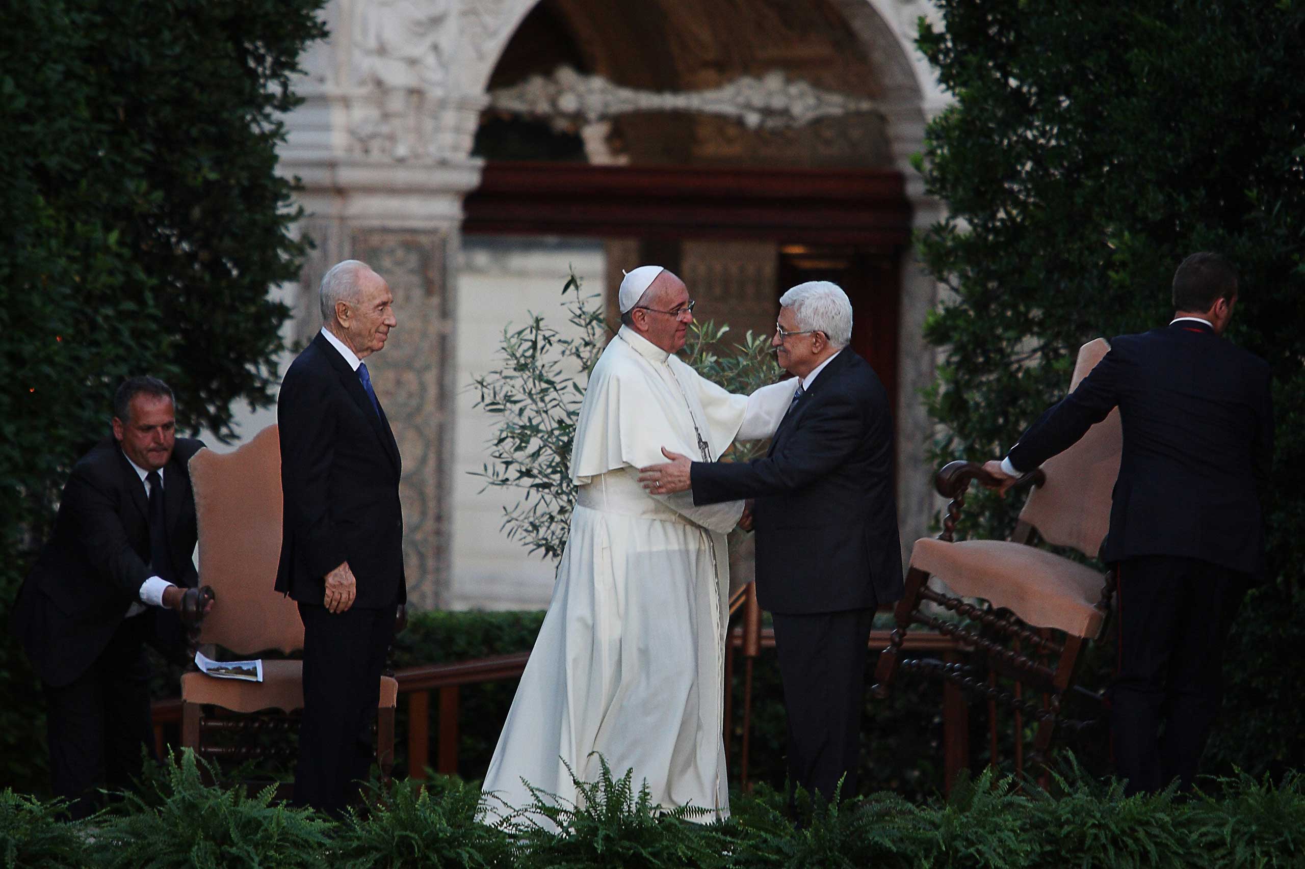 Pope Francis with Palestinian leader Mahmud Abbas and Israeli President Shimon Peres during a joint peace prayer at the Vatican Gardens, Vatican City,  June 8, 2014.
