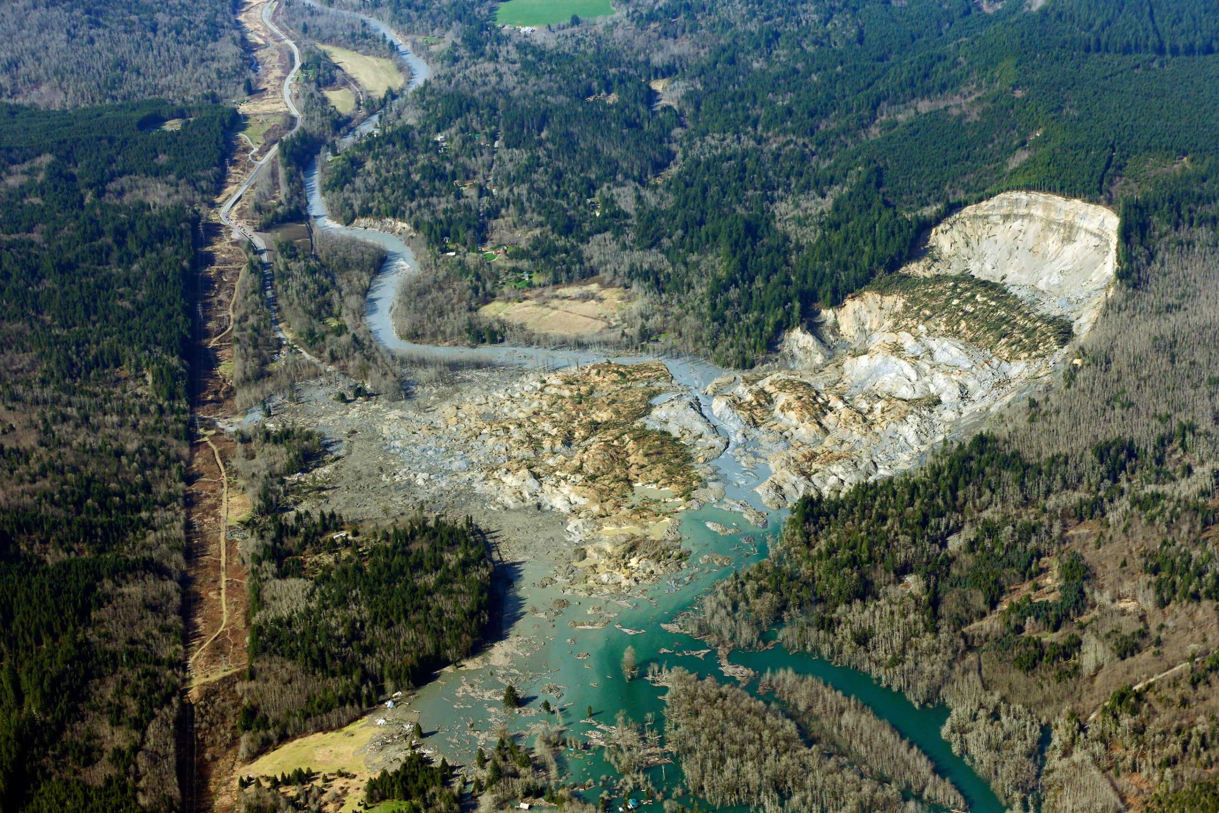 An aerial view of a mudslide that killed at least eight people and left dozens missing near Arlington, Wash. March 24, 2014.