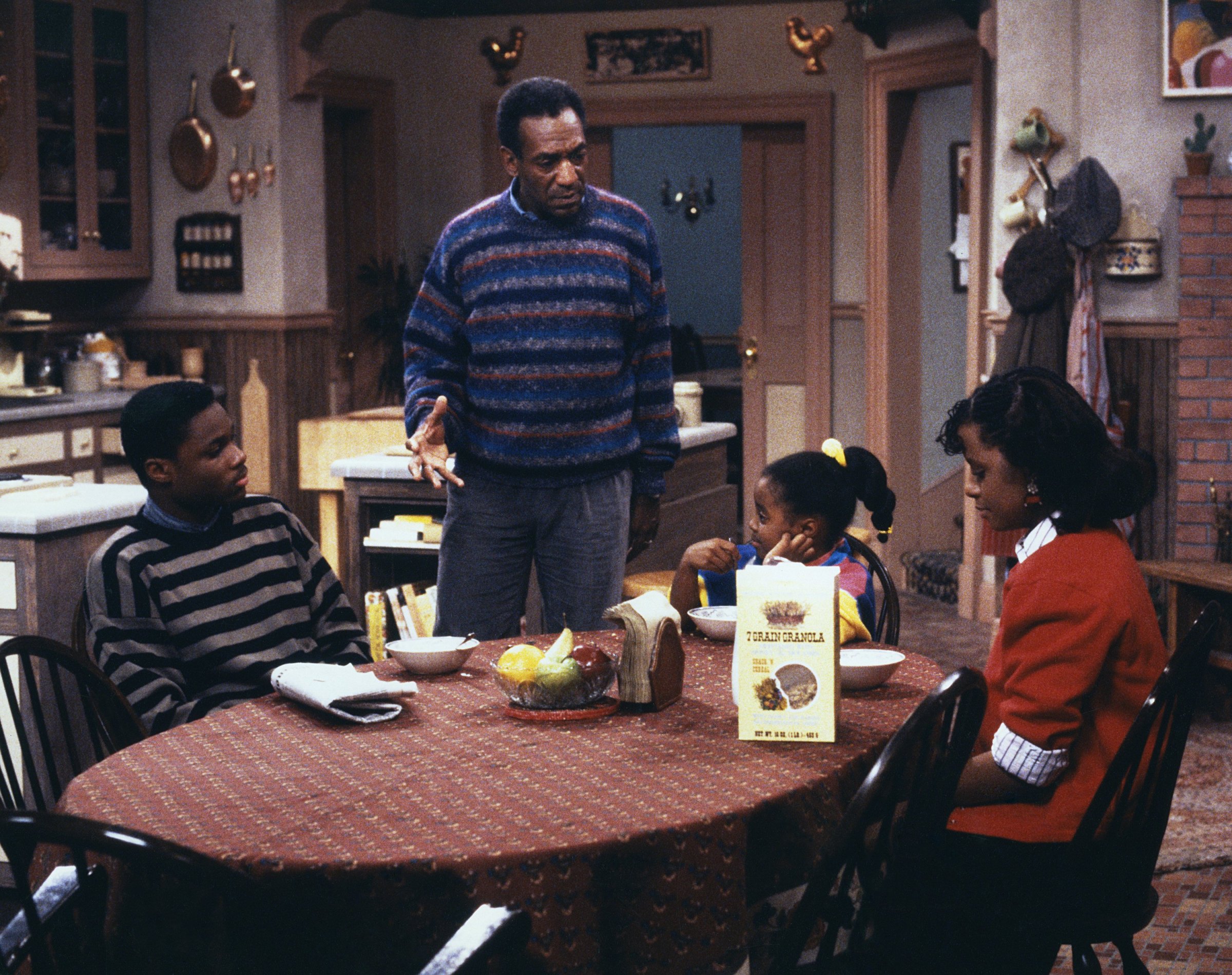 (Left to Right) Malcolm-Jamal Warner as Theodore 'Theo' Huxtable, Bill Cosby as Dr. Heathcliff 'Cliff' Huxtable, Keshia Knight Pulliam as Rudy Huxtable, Tempestt Bledsoe as Vanessa Huxtable on The Cosby Show.