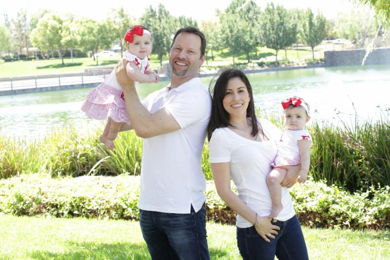 Christian and Alysia Padilla-Vacarro and their healthly twins Annabella (left) and Evangelina. Now with a newly-restored immune system, Evangelina lives a normal and healthy life.