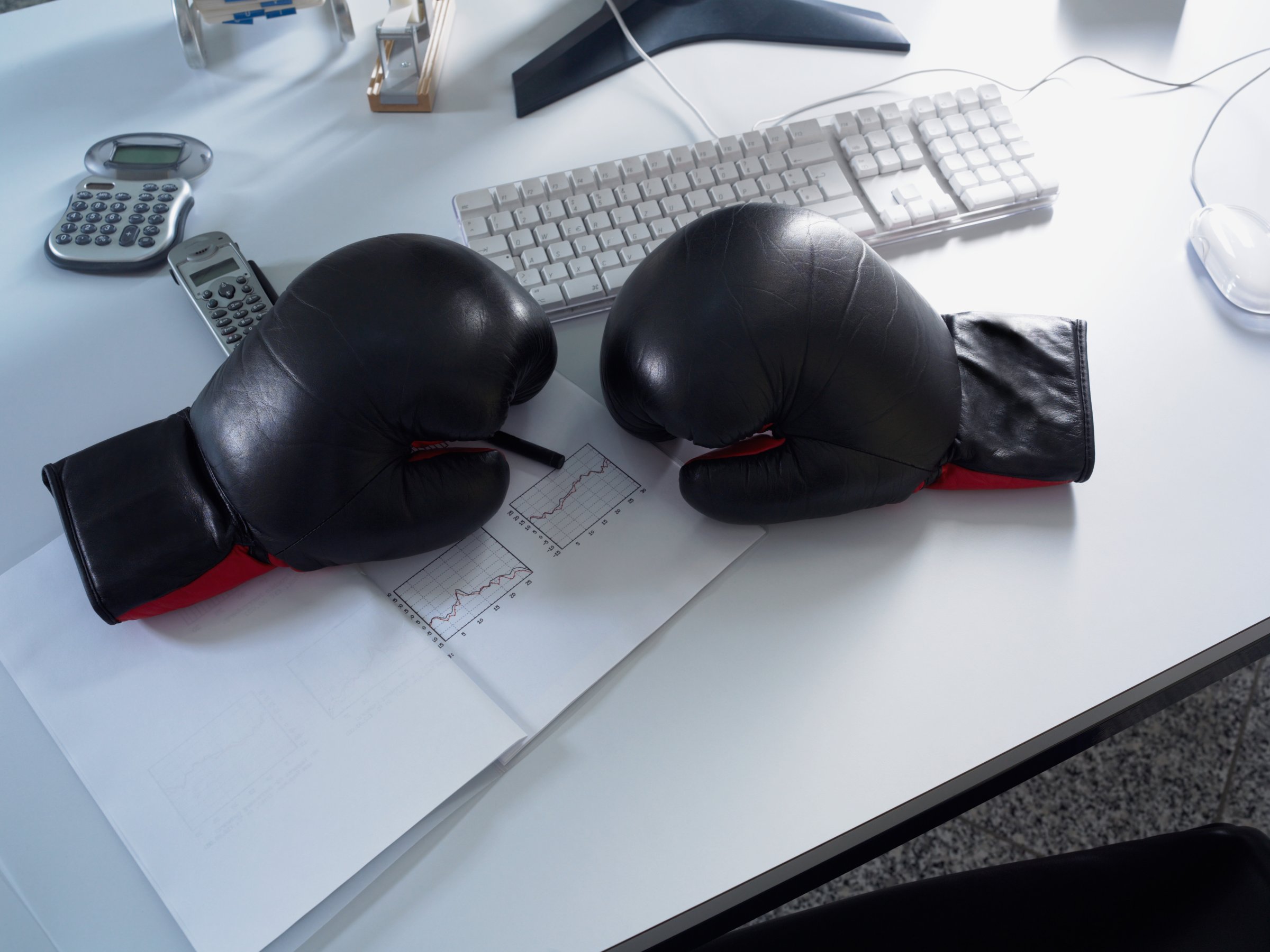 Boxing gloves on desk