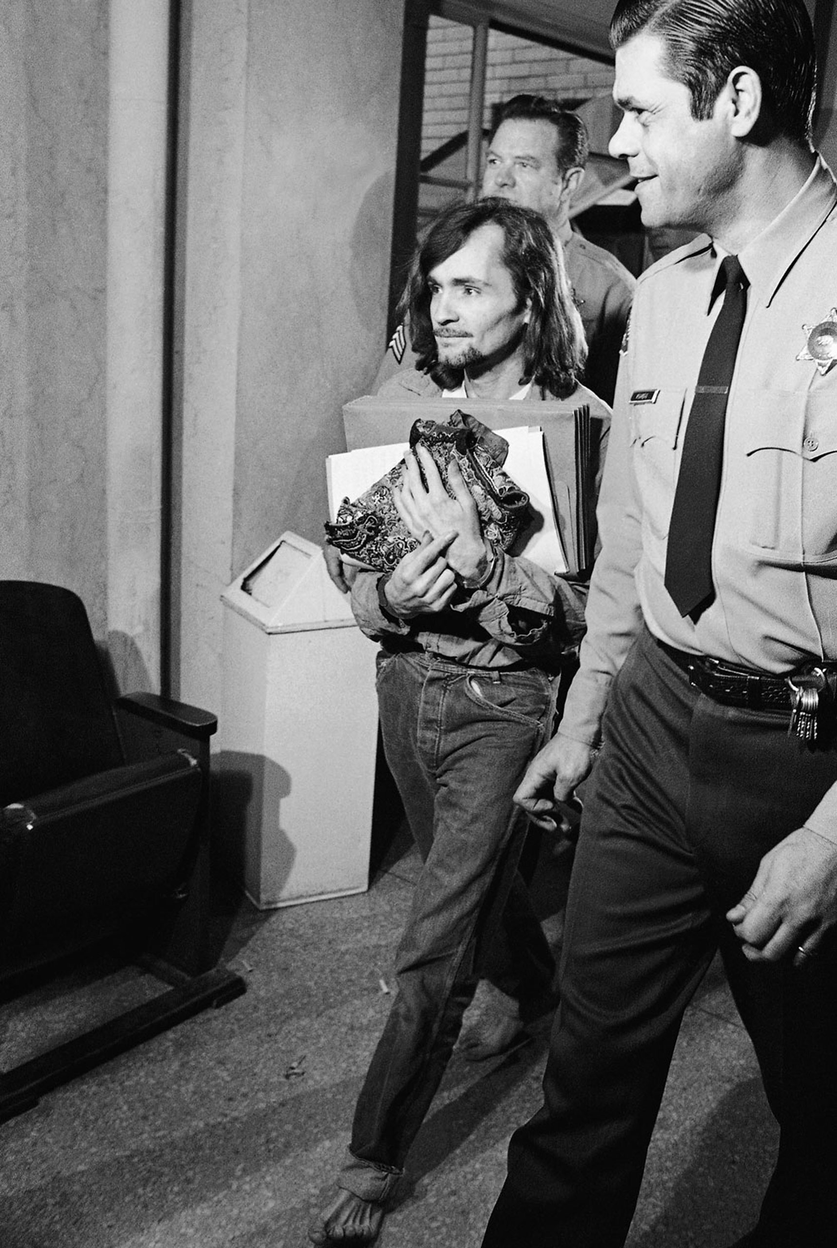 Charles Manson, accused of seven killings including that of actress Sharon Tate, leaves a Los Angeles courtroom, on Feb. 16, 1970 where he was denied a change of venue.