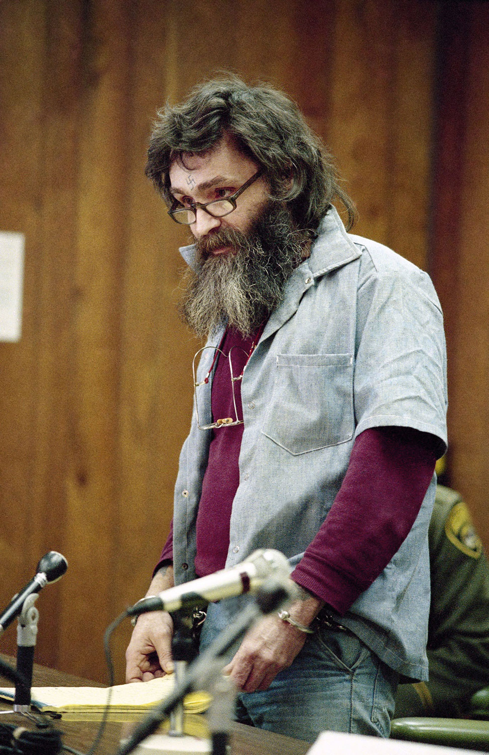 Manson appears at his parole hearing at San Quentin, Calif., in 1985.