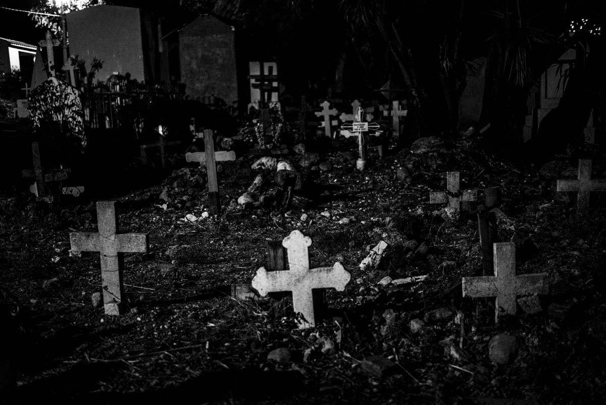 The main cemetery in Chilpancingo, the capital and second-largest city of the state of Guerrero, Mexico. The city is on the Mexican Federal Highway 95 which connects Acapulco to Mexico City. Guerrero state, on the Pacific coast, is an important transit point for illegal shipments of cocaine and heroin arriving from South America en route to the United States, the world's largest illegal drug market. Many of the graves in the cemetery are related to drug cartel violence in the region. Sebastian Liste—NOOR FOR TIME