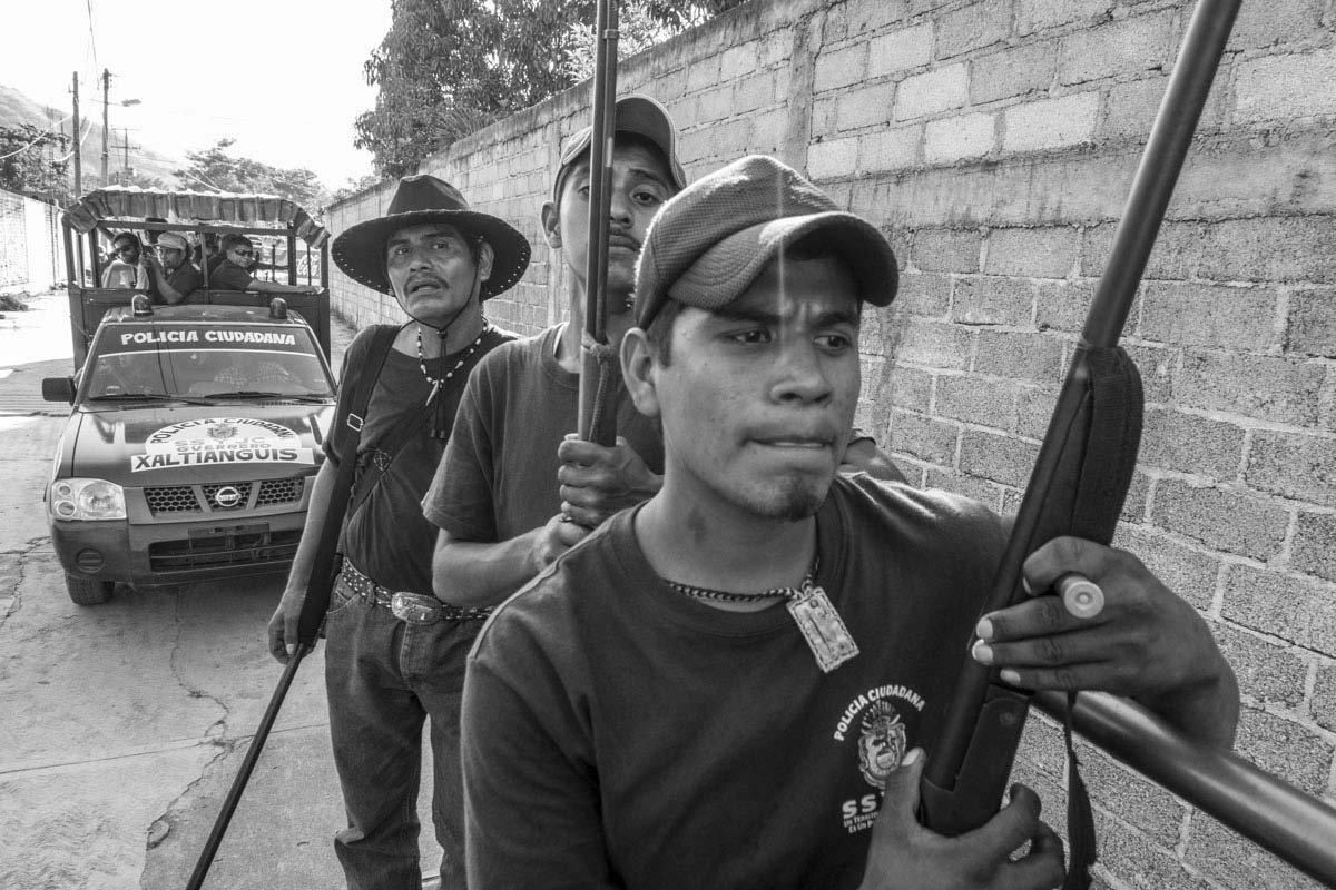 XALTIANGUIS, MEXICO - NOVEMER 2, 2014:Patrol of Community Police of Xaltianguis. It´s one of the biggest and more important in Guerrero State. They searched for the students immediately after they disappeared on September 26th in Iguala. Since then, the community has been demonstrating and blocking the road from Mexico DF to the touristic Acapulco.Sebastian Liste—NOOR FOR TIME