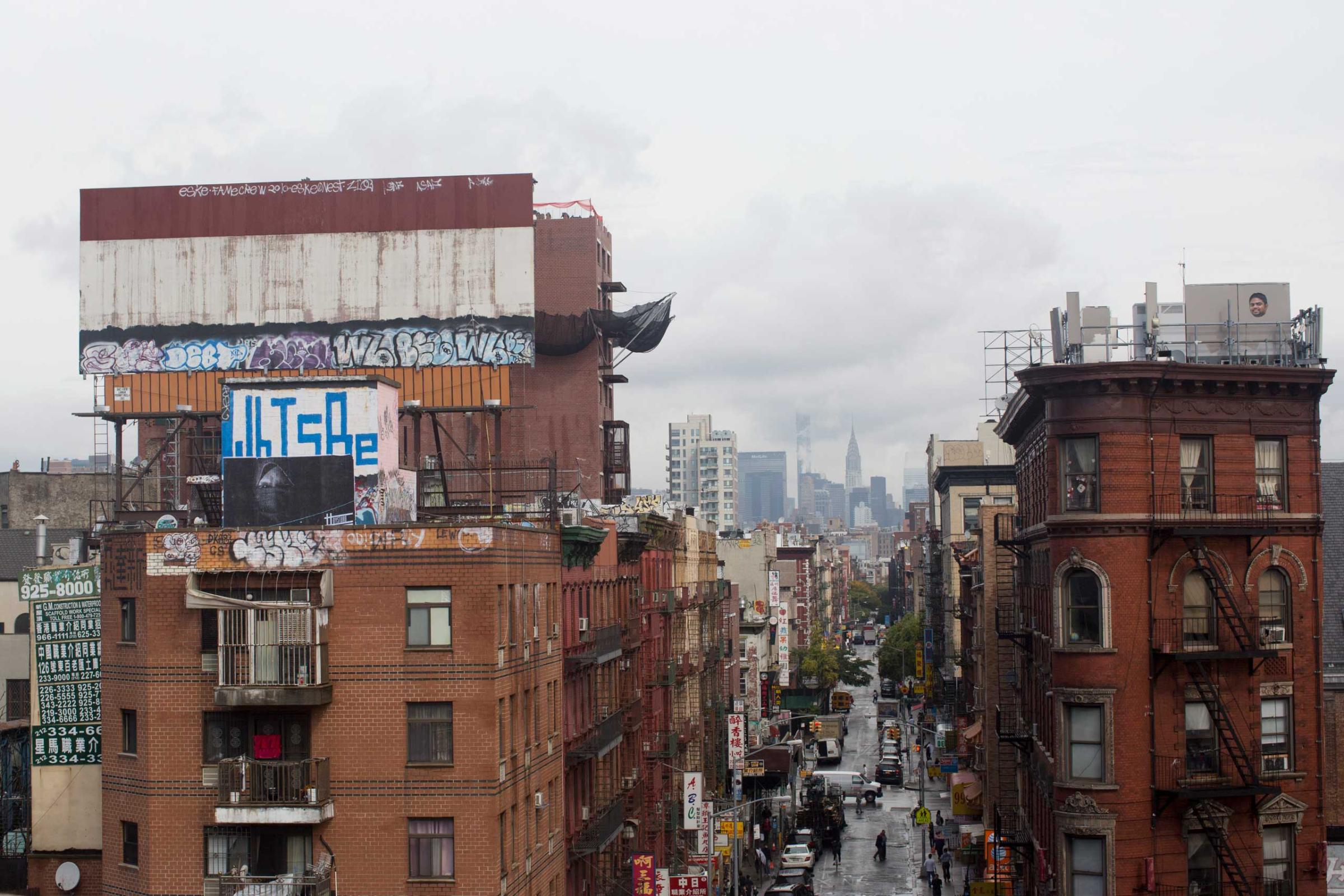 One of Dysturb's photograph on a rooftop in New York (on Division Street in Chinatown). October 16th 2014.