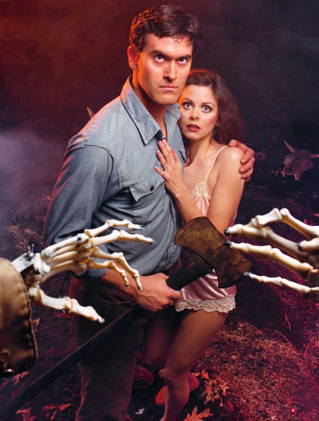 Bruce Campbell and Theresa Tilly in the 1981 film <i>The Evil Dead</i> (New Line Cinema)