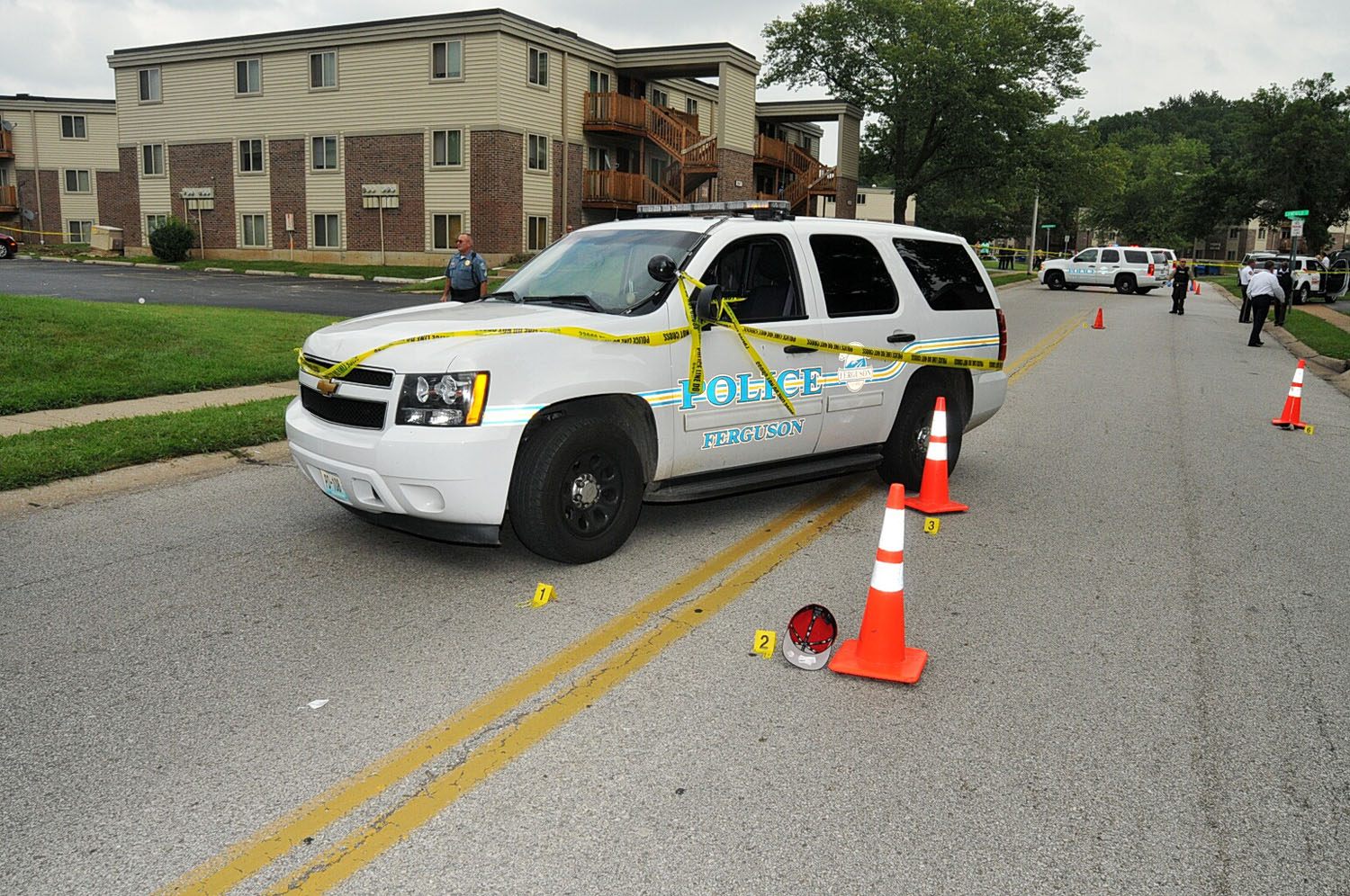 Officer Darren Wilson's vehicle is shown at the scene of the confrontation in this undated evidence photograph made available by the St. Louis County prosecutors office