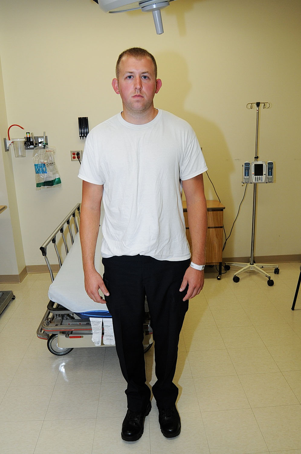 An undated evidence photograph made available by the St. Louis County prosecutors office on Nov. 25, 2014 shows Ferguson police officer Darren Wilson during his medical examination after the shooting of Michael Brown.