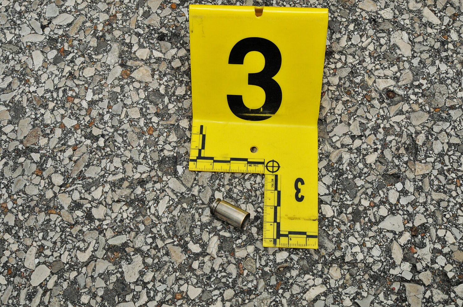 An undated evidence photograph made available by the St. Louis County prosecutors office on Nov. 25, 2014 shows the a bullet casing from the gun of Ferguson police officer Darren Wilson that was used in the shooting death of teenager Michael Brown in August 2014.