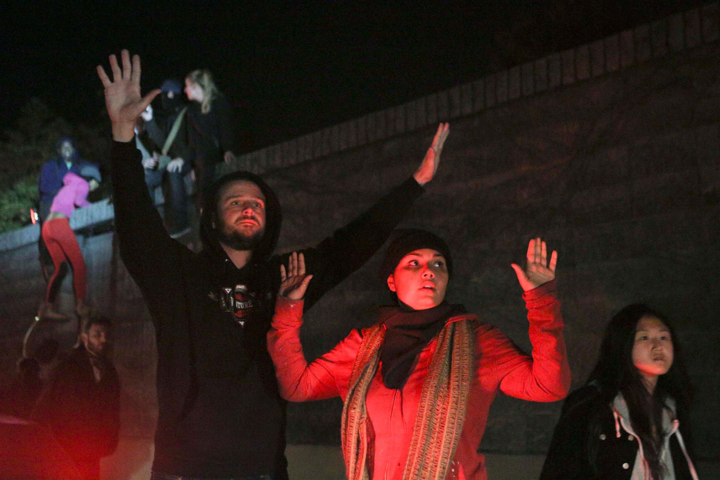 Protestors block the freeway during a demonstration in Oakland, Calif., on Nov. 24, 2014.