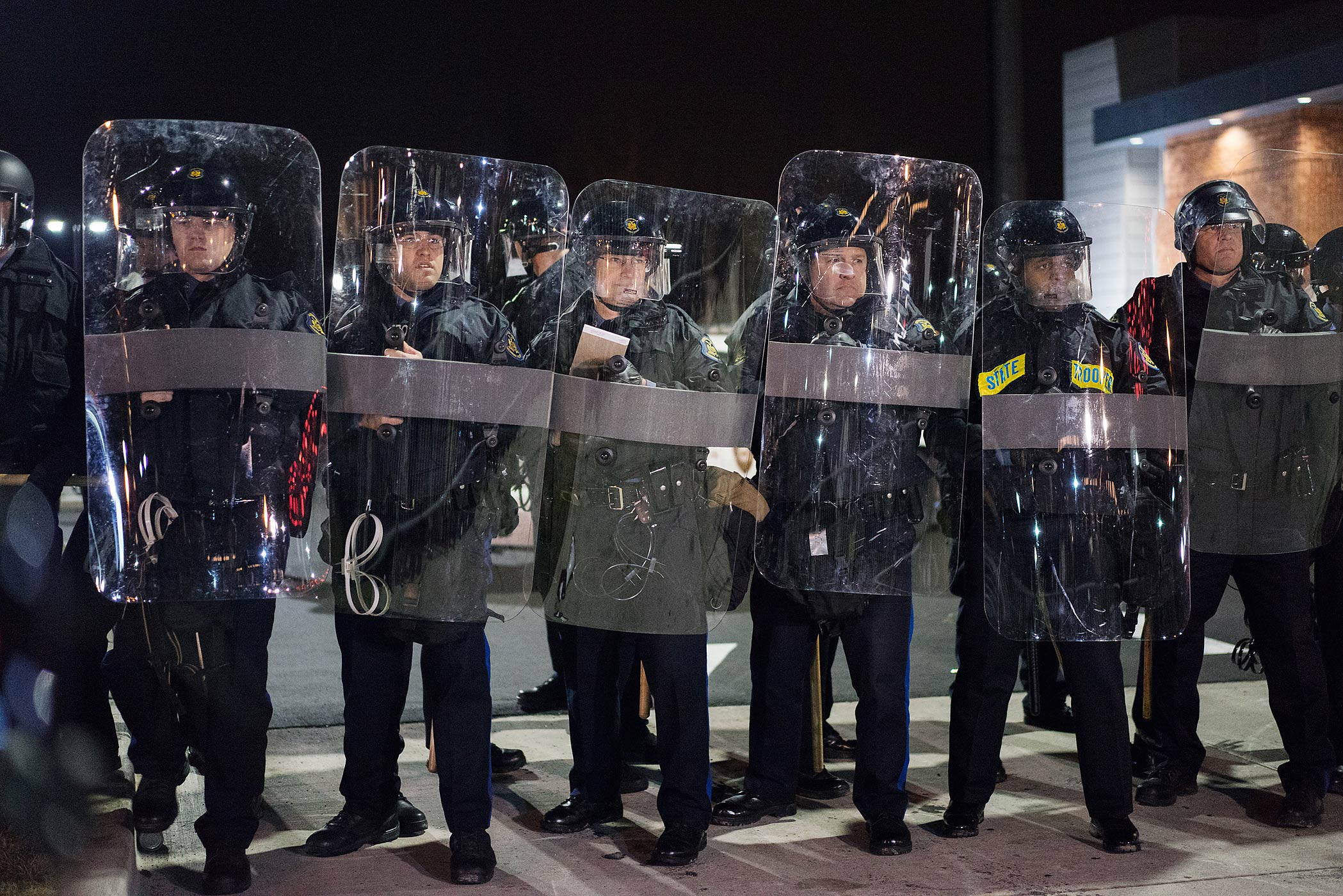 Police officers in riot gear stand guard in Ferguson, Mo. on Nov. 24, 2014 (Barrett Emke for TIME)