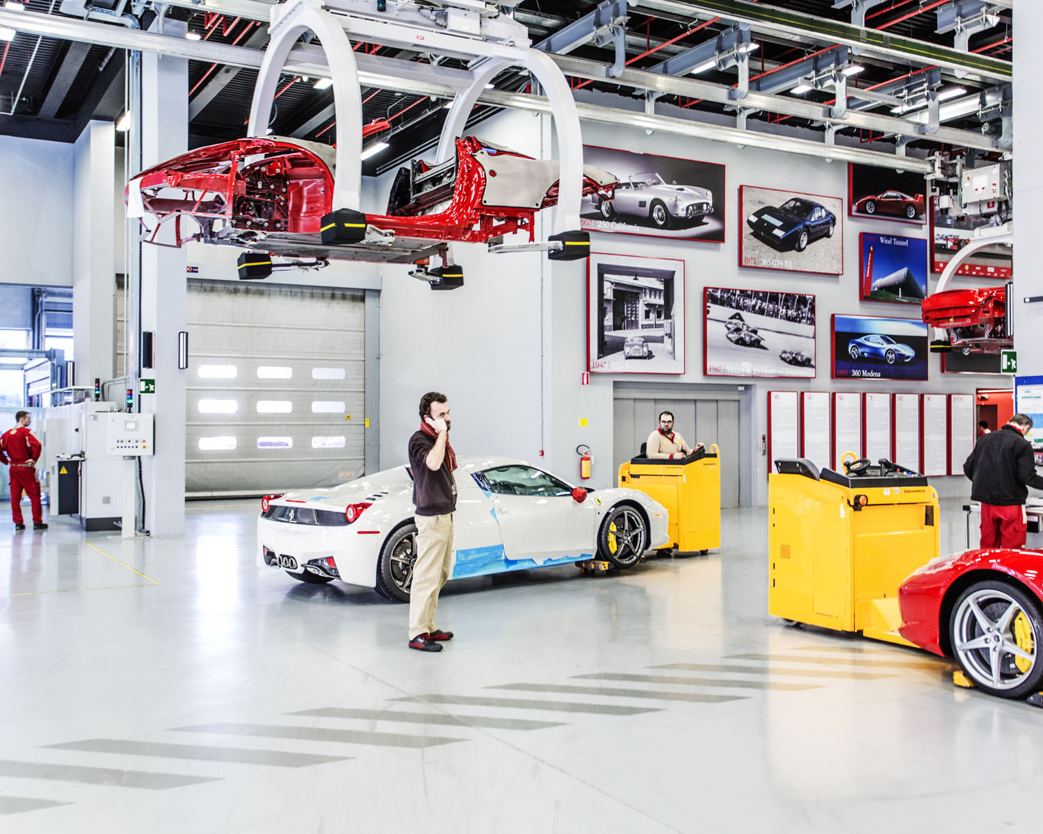 The Ferrari assemly line inside the cittadella of Maranello, Modena- Italy. The New Assembly Line area from the pen of Jean Nouvel, where technological excellence and meticulous craftsmanship combine the 8 and 12-cylinder cars assembled in a light-filled, transparent space also enriched by green areas.