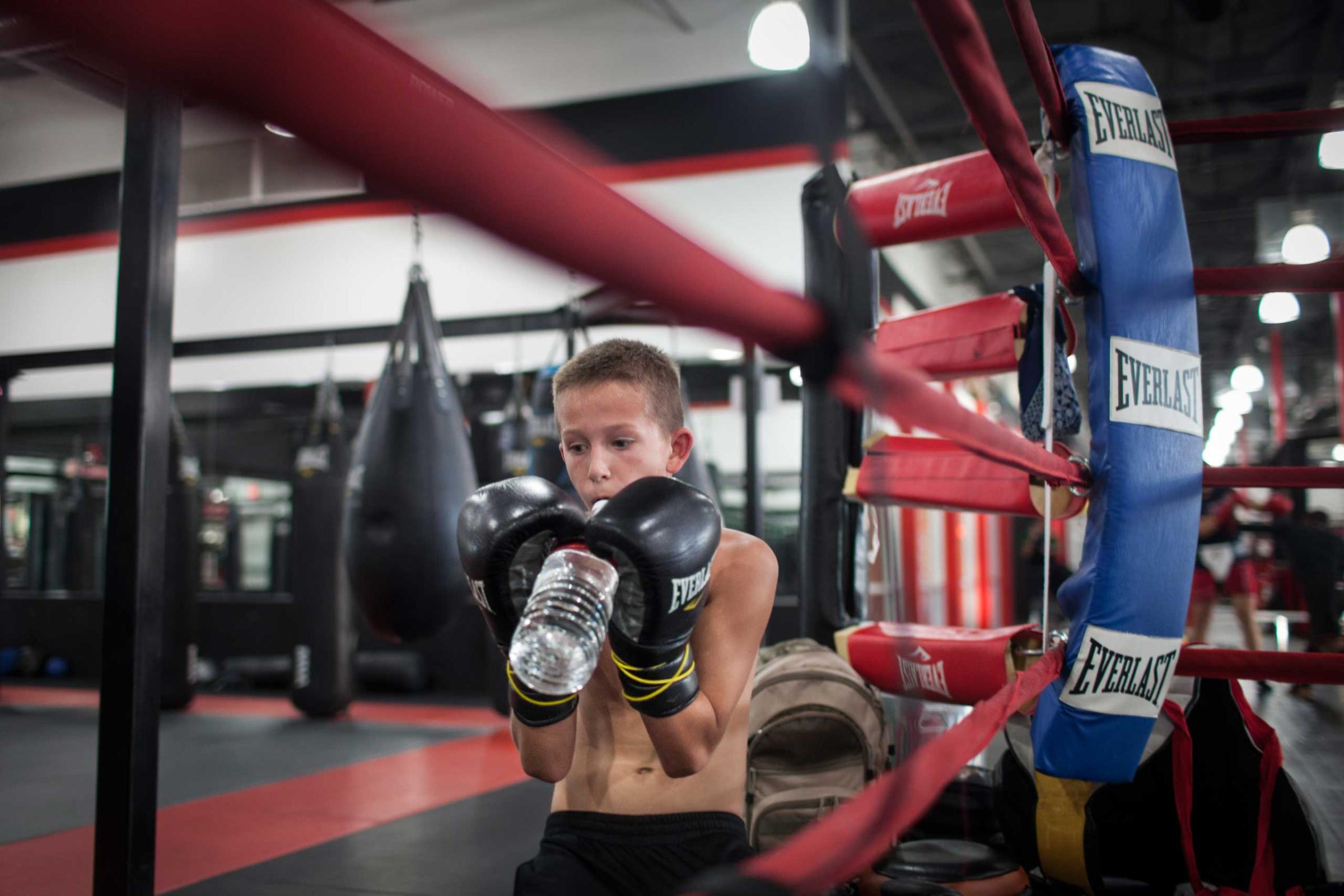William Reid, 10, at a private boxing class in Power MMA gym, Mesa, Arizona, November 19th 2013. Photo: Miikka Pirinen