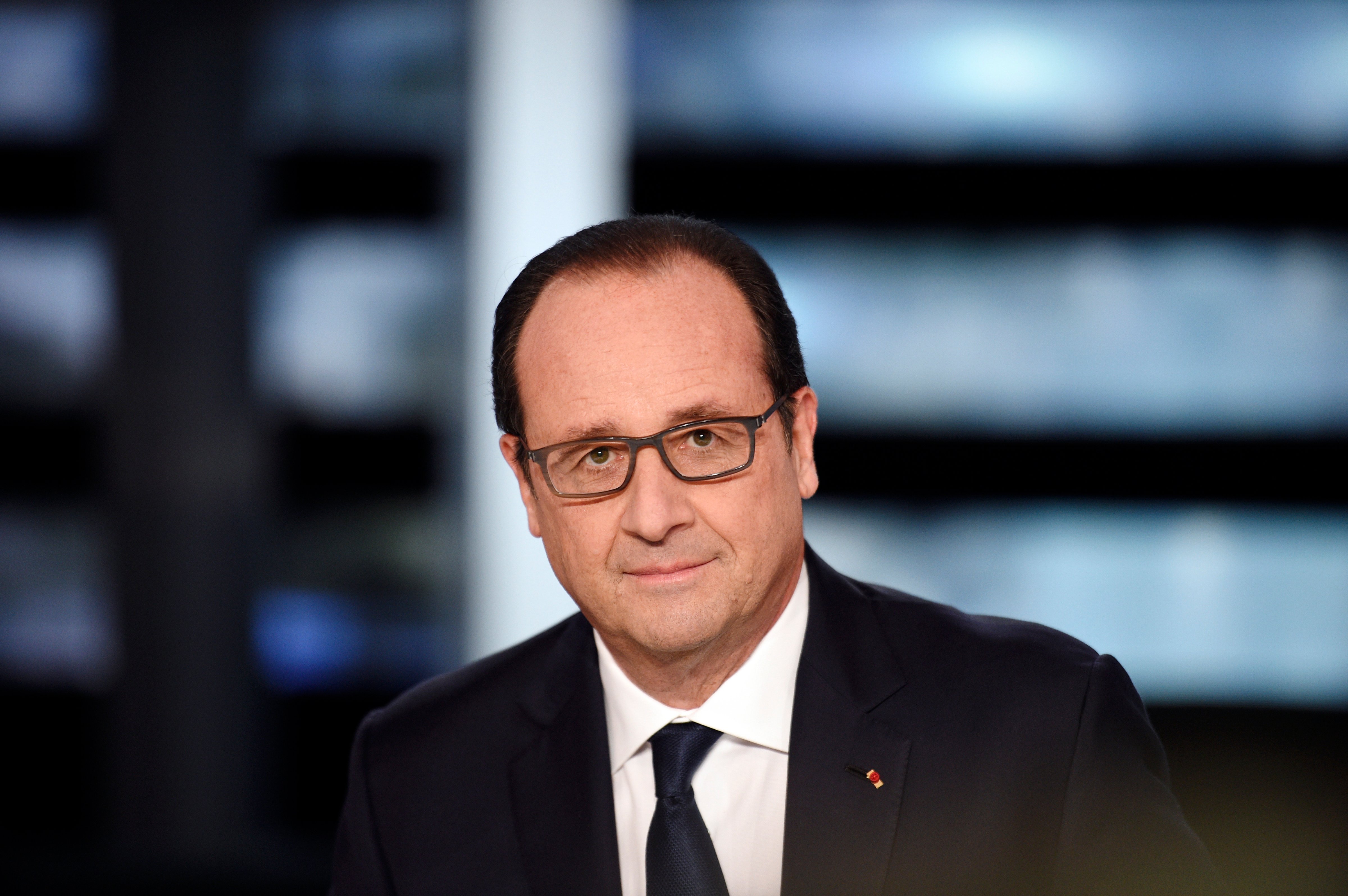 French President Fran&ccedil;ois Hollande poses on a TV set prior to the start of a French channel TF1 broadcast show, in Aubervilliers, outside Paris, on Nov. 6, 2014 (Martin Bureau—AP)