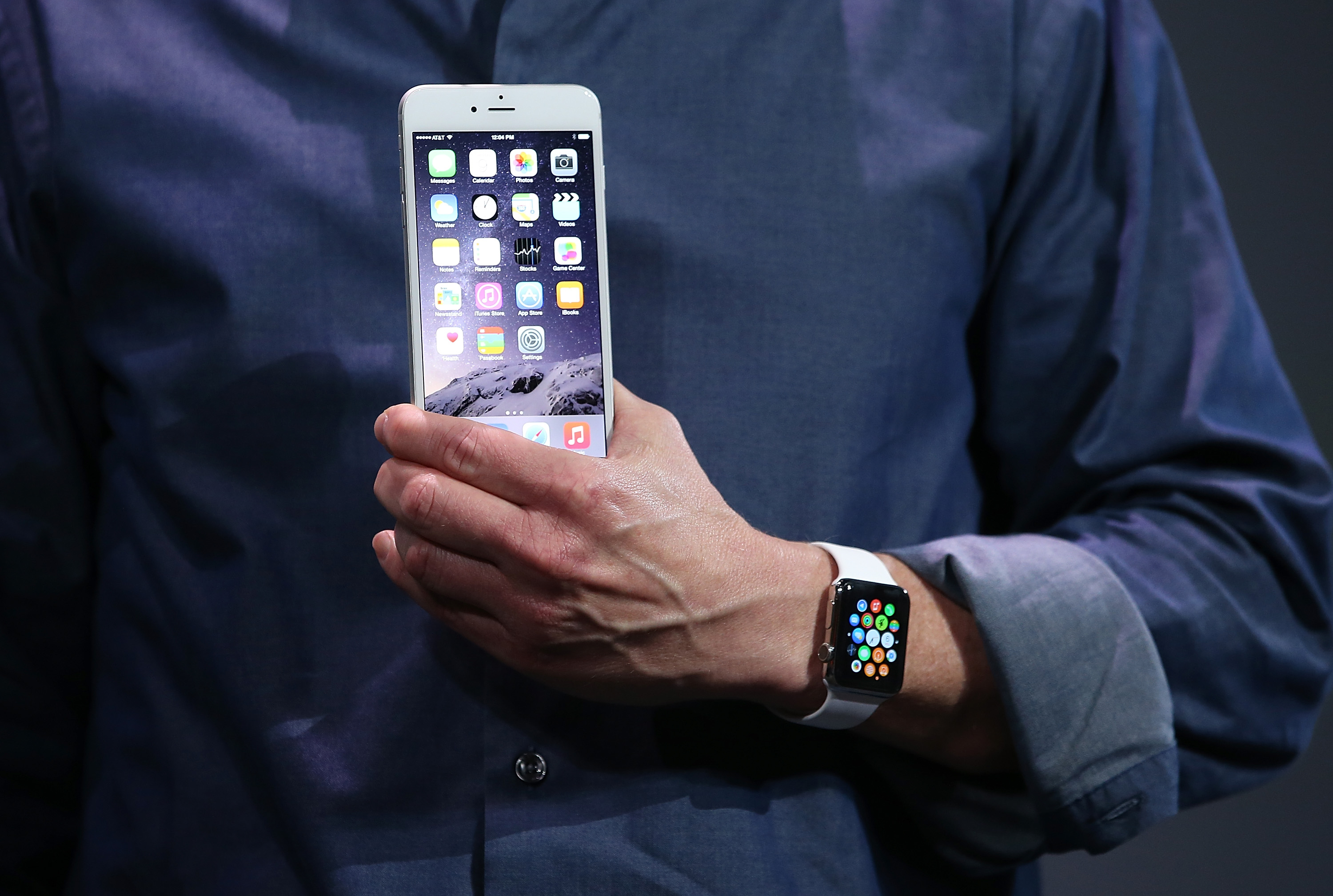 Apple CEO Tim Cook shows off the new iPhone 6 and the Apple Watch during an Apple special event at the Flint Center for the Performing Arts on September 9, 2014 in Cupertino, California. (Justin Sullivan&mdash;Getty Images)
