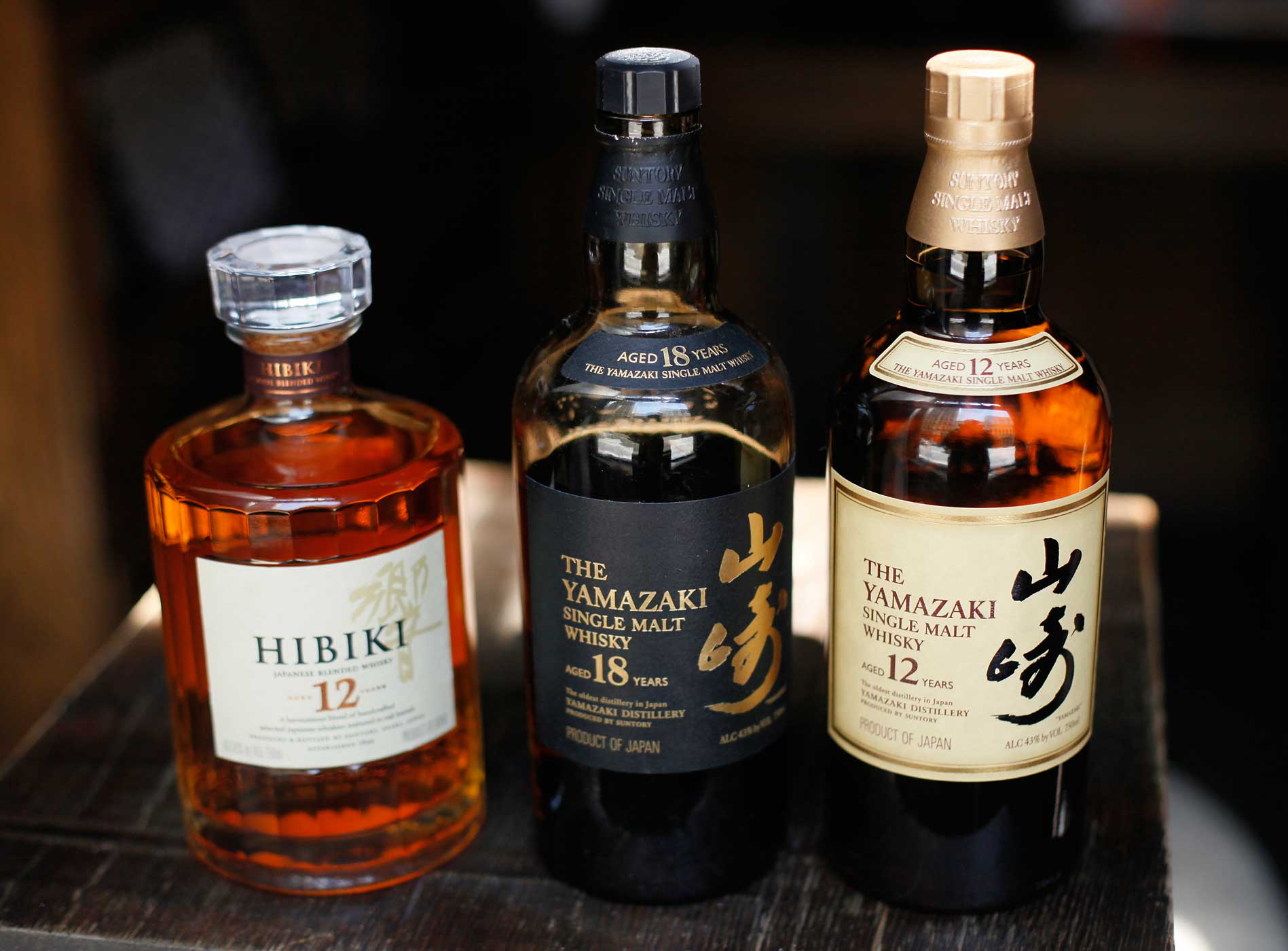 From left are Hibiki 12-year-old, Yamazaki 18 and 12-year-old Japanese whiskys at the Rickhouse bar in San Francisco, Aug. 6, 2010. (Eric Risberg—AP)