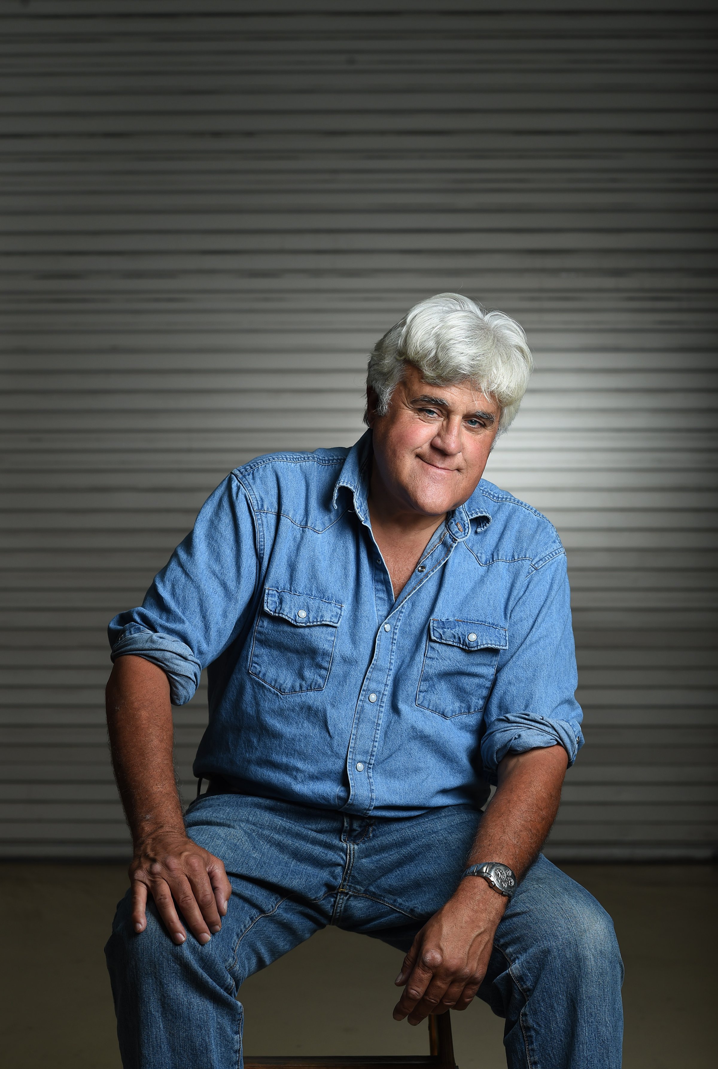 Jay Leno poses for a portrait at his car garage on Sept. 24, 2014 in Burbank, Calif.