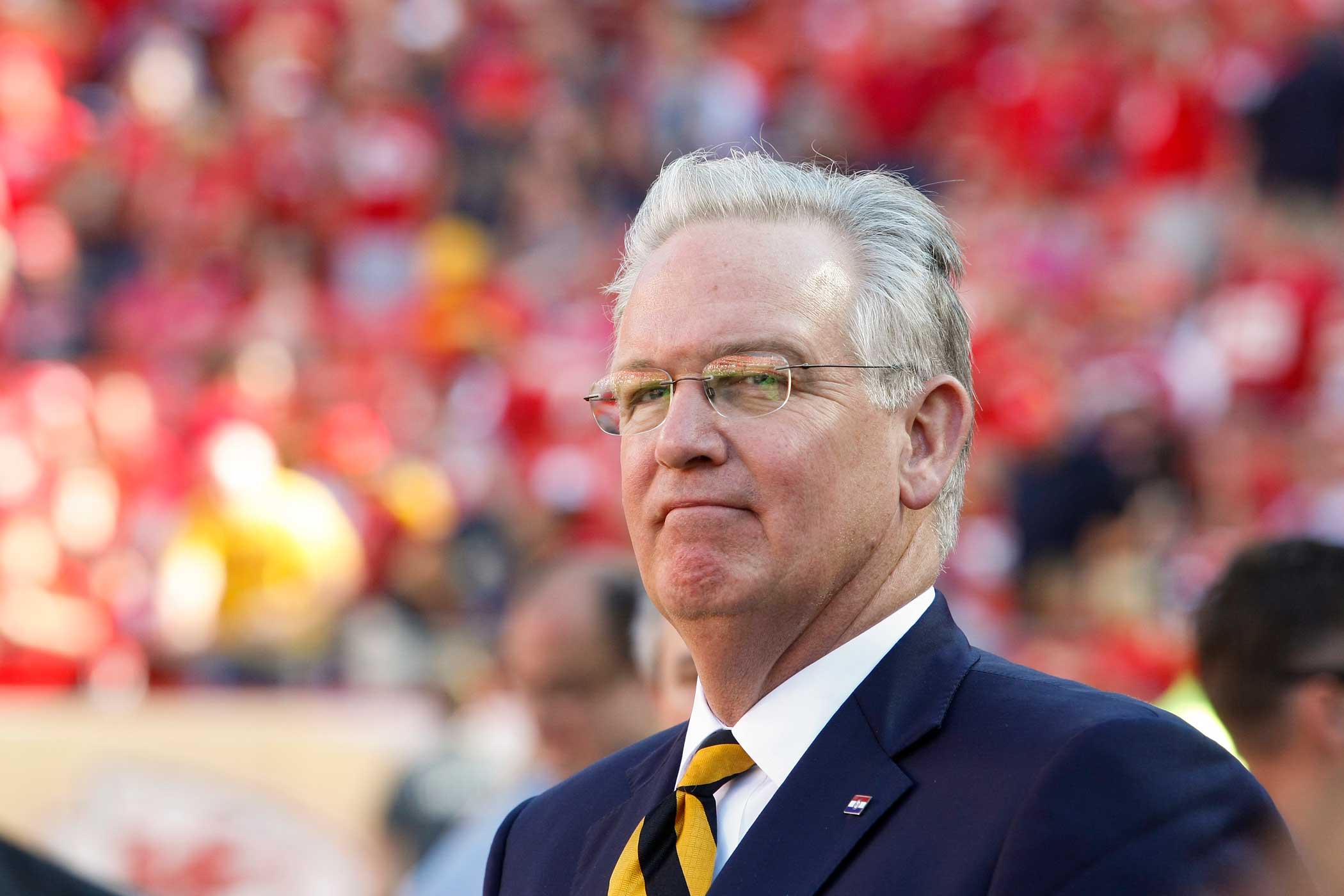 Missouri Gov. Jay Nixon follows the game between the Kansas City Chiefs and the St. Louis Rams in the second half of an NFL football game in Kansas City, Mo., Sunday, Oct. 26, 2014. (Colin E. Braley—AP)